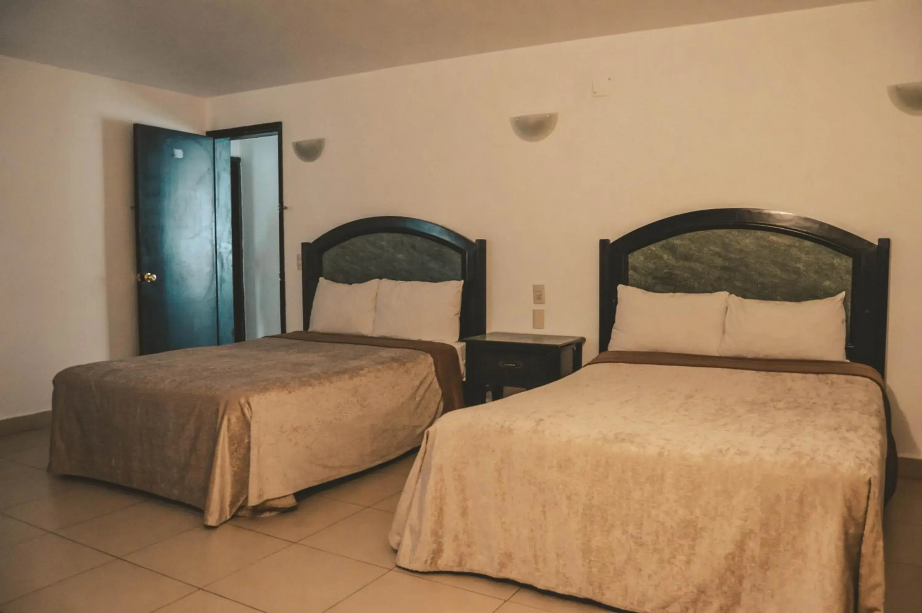 Double Room with Two Double Beds in Hotel Latino Double Room with Two Double Beds in Hotel Latino