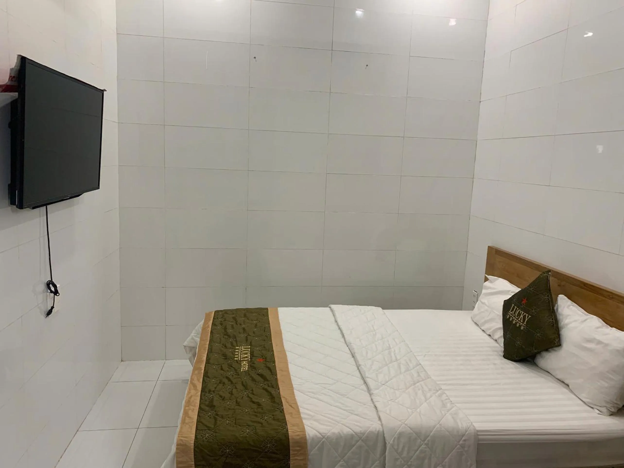 Bed in LUCKY HOTEL LIEN PHUONG