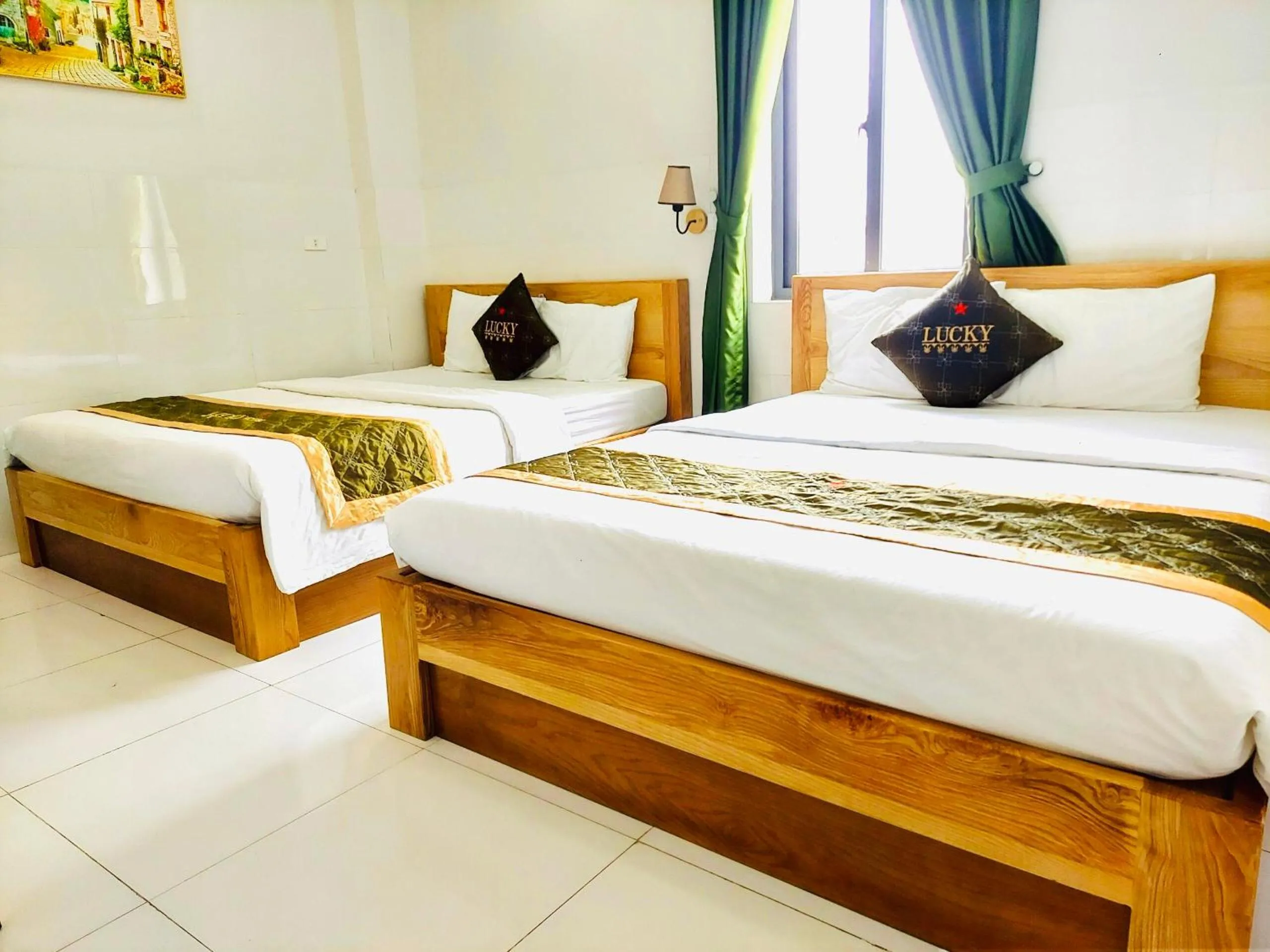 Bed in LUCKY HOTEL LIEN PHUONG