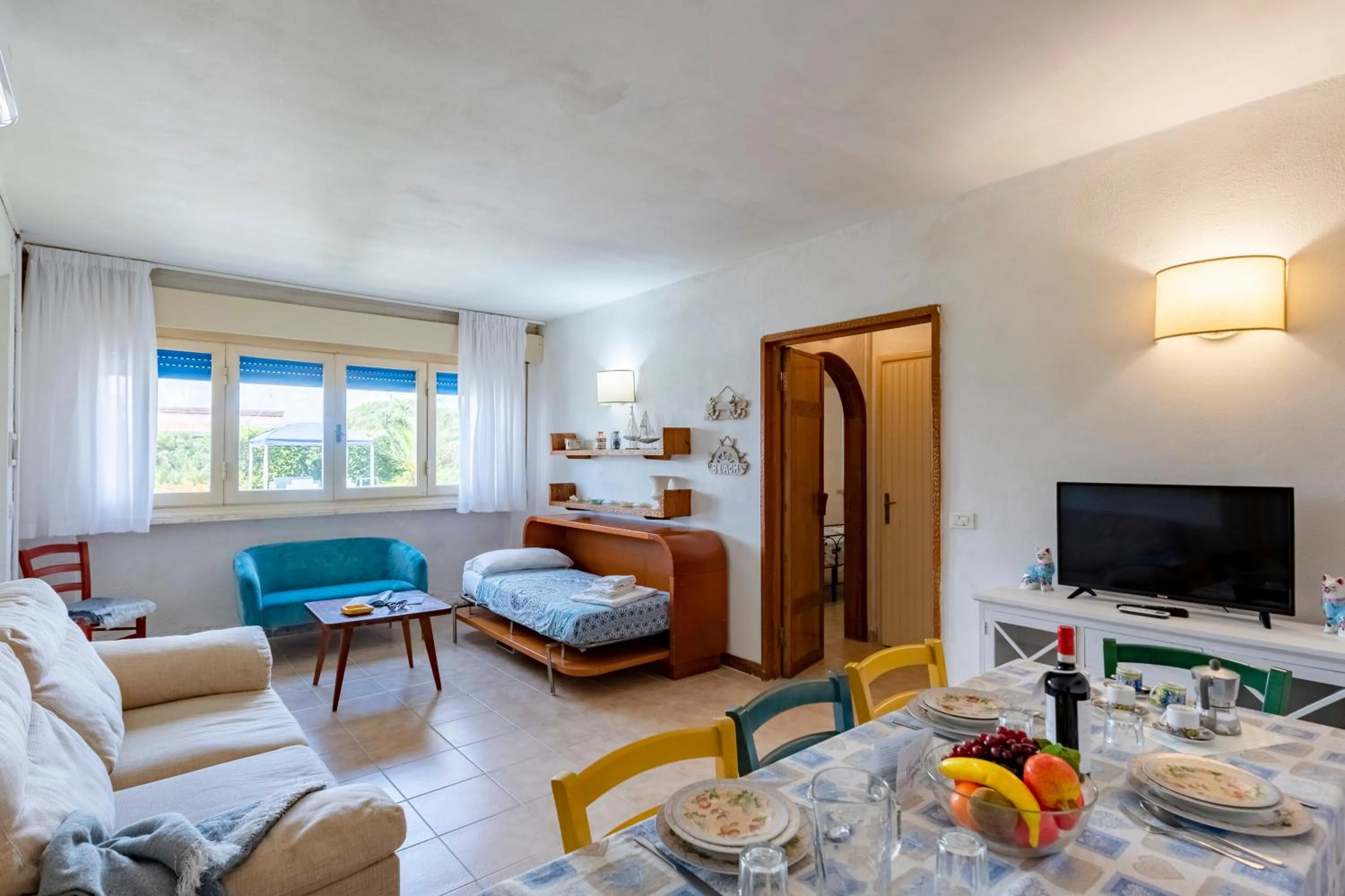 Living room, Bed in La Casina Del Pescatore On the Beach - Happy Rentals