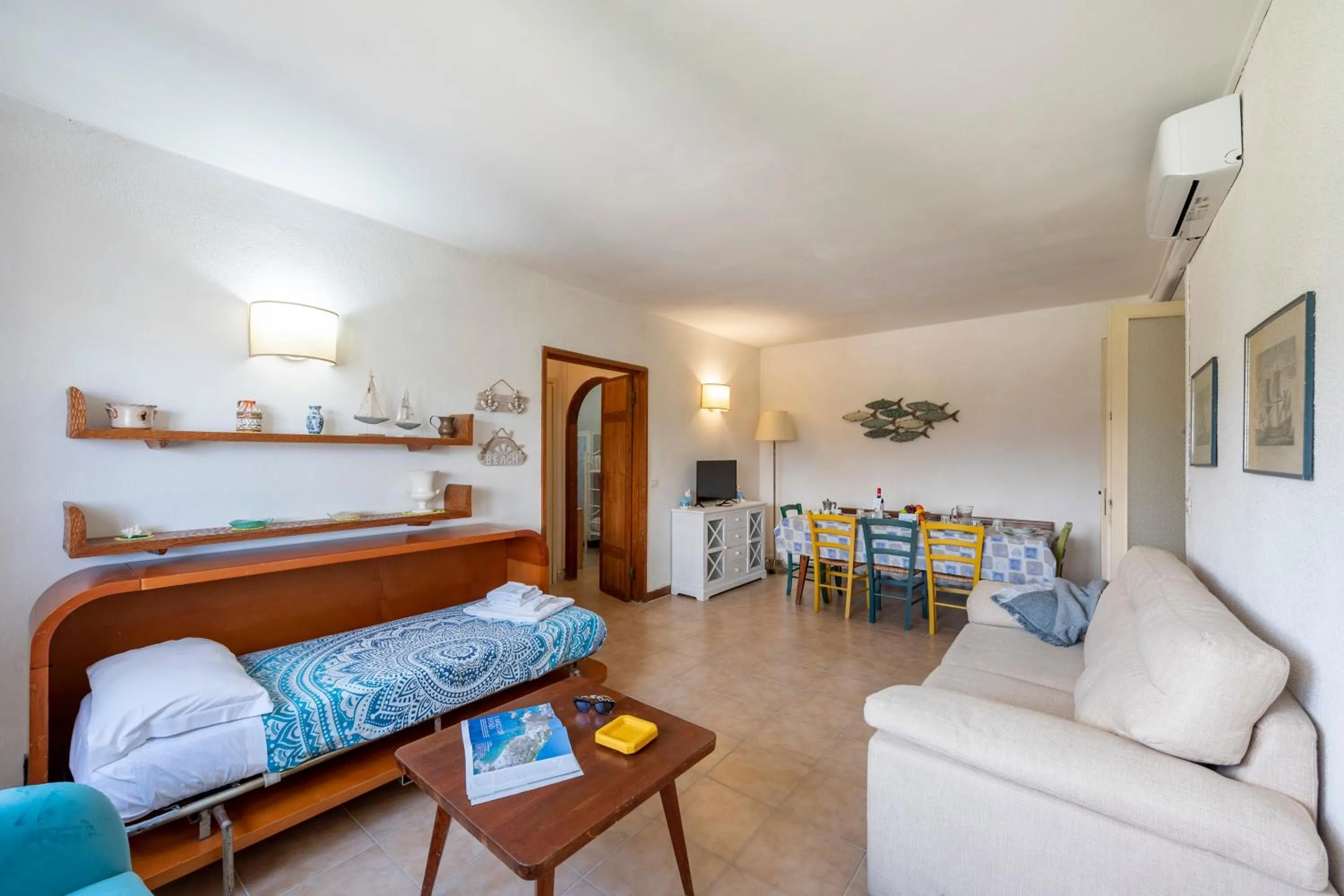 Living room in La Casina Del Pescatore On the Beach - Happy Rentals