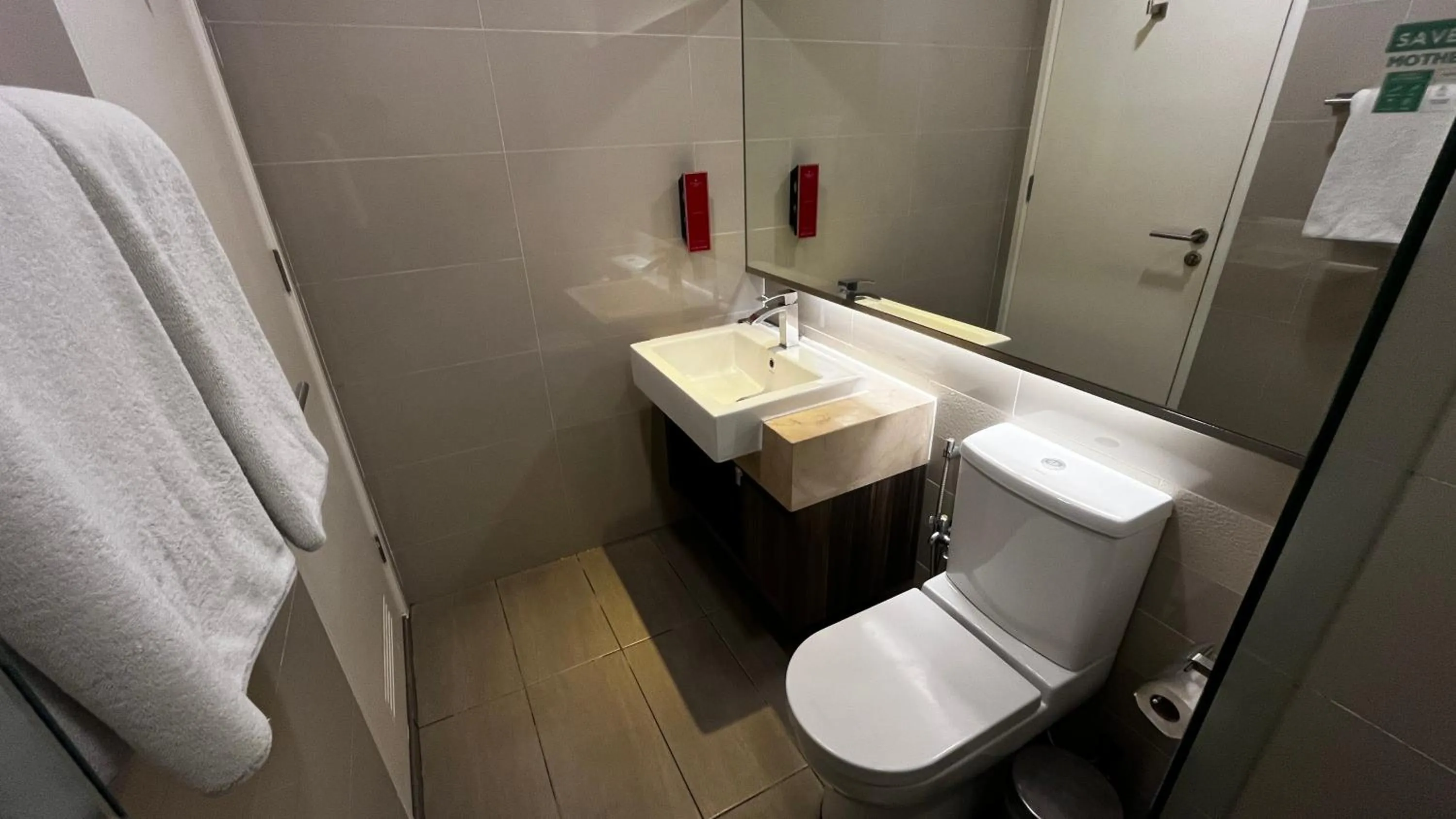 Bathroom in Ramada Suites by Wyndham Kuala Lumpur City Centre