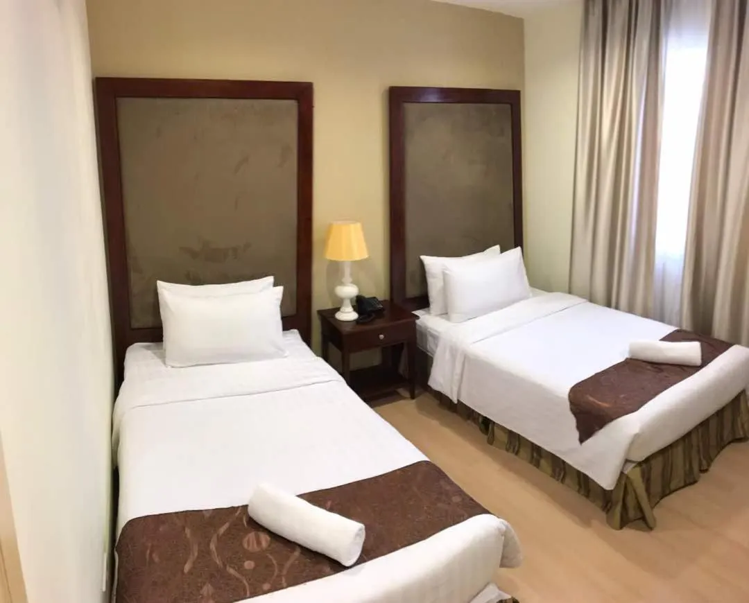 Bed in The Capital Residence Suites