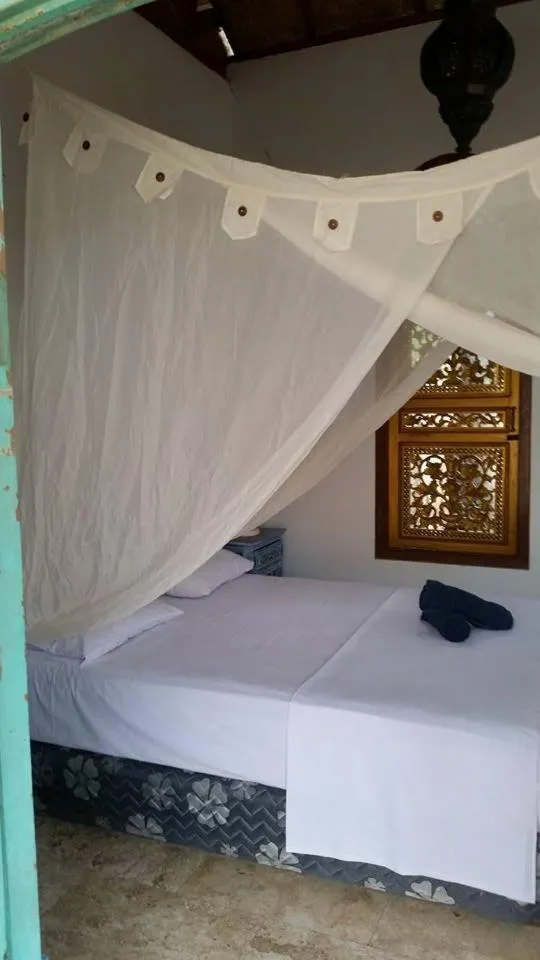 Bed in Elephant House and Bungalows Gili Air