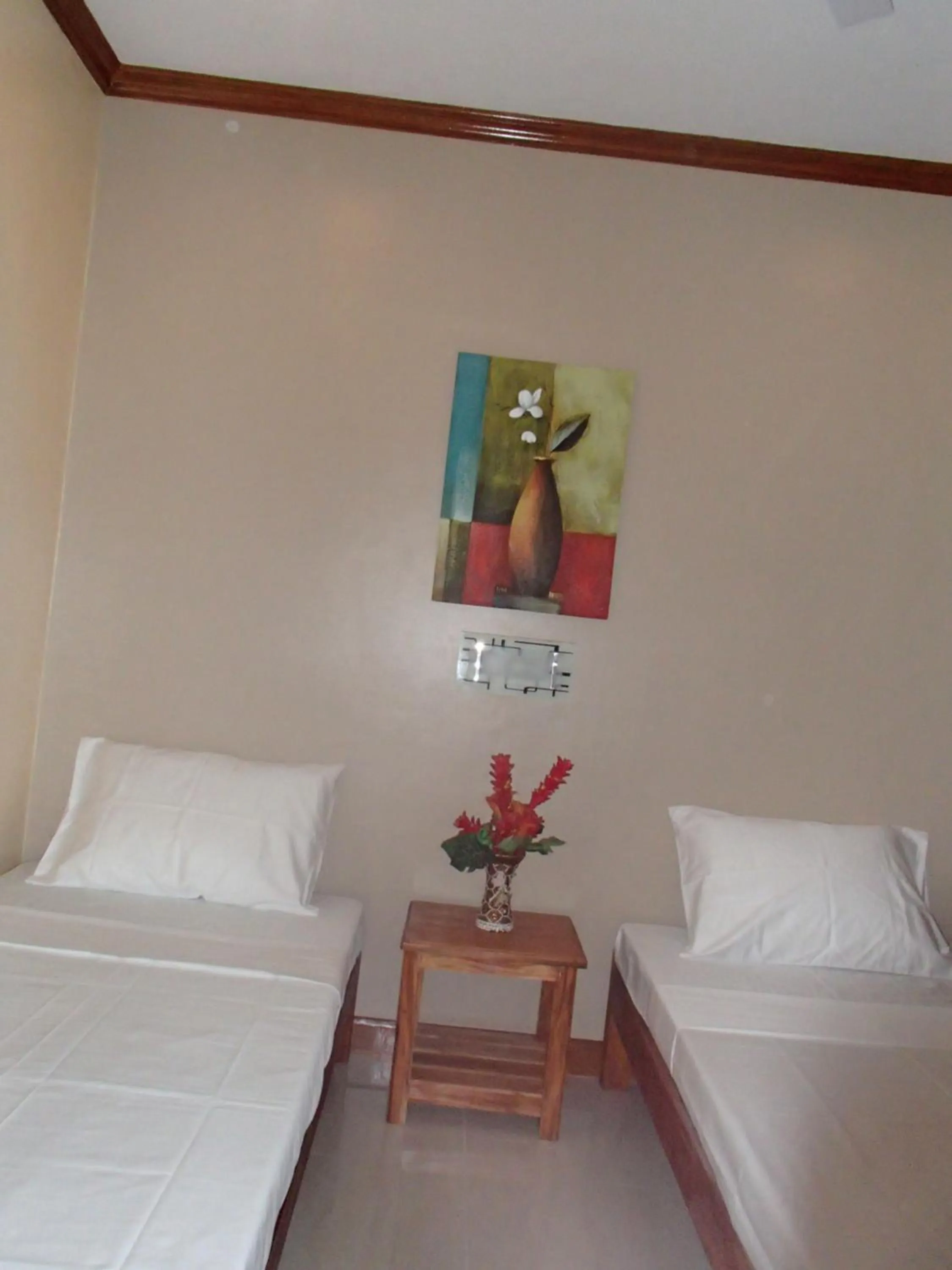 Bed in Malapascua Starlight Resort