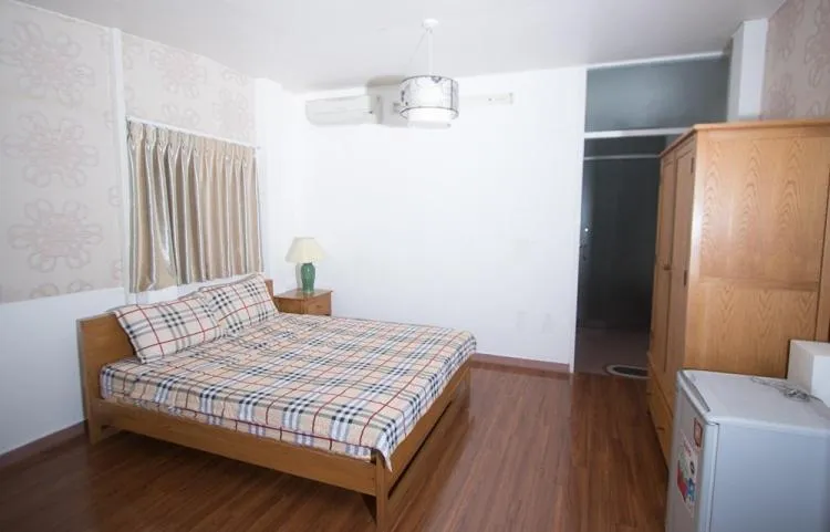 Bed in Smiley Apartment 3