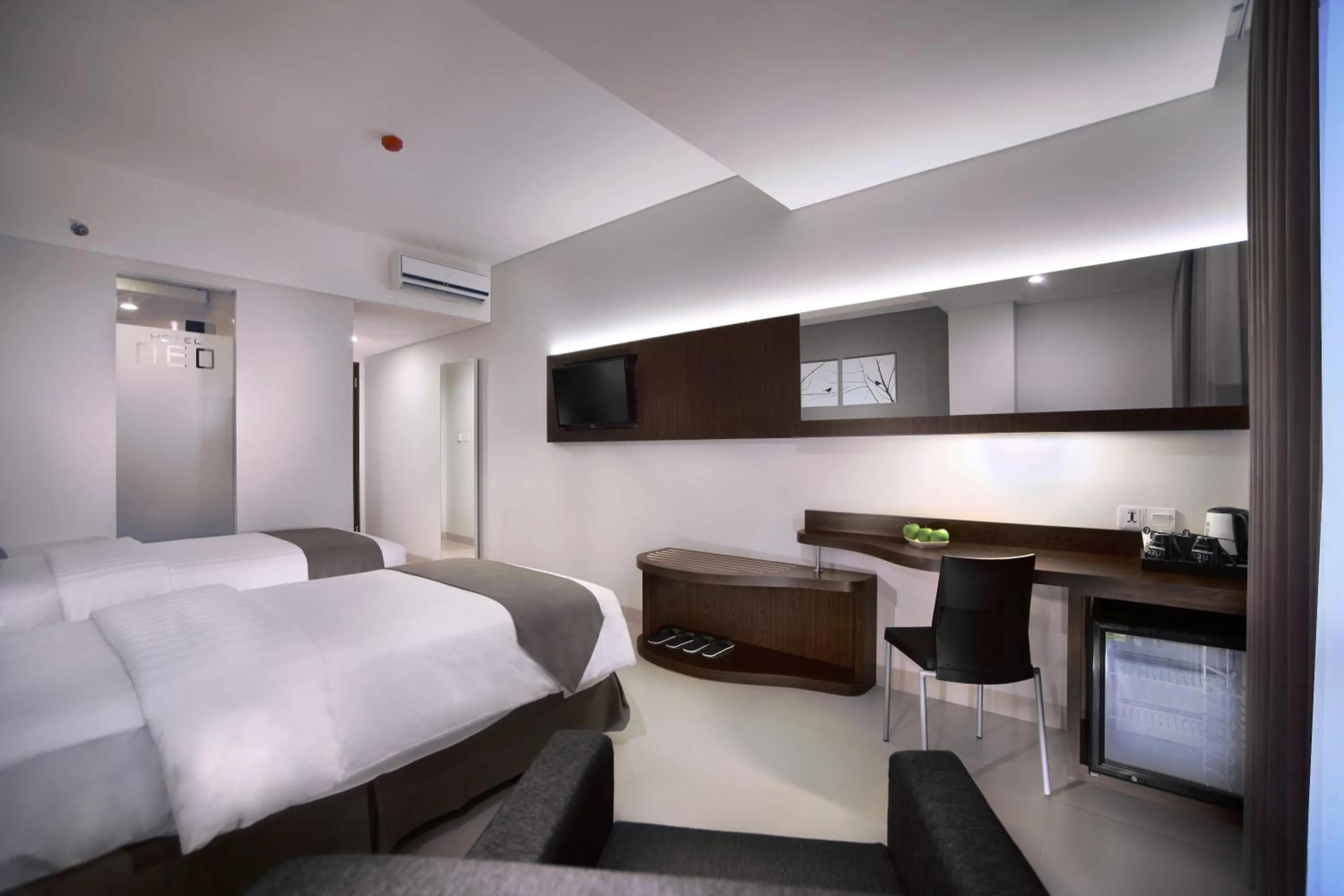 Photo of the whole room, Bed in Neo Denpasar by ASTON