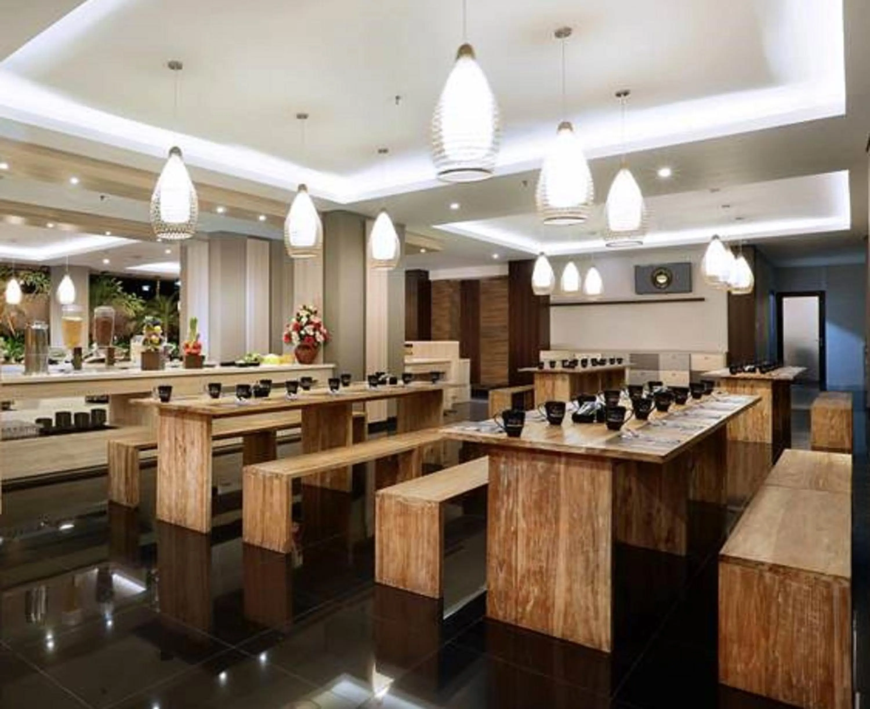 Dining area in Neo Denpasar by ASTON