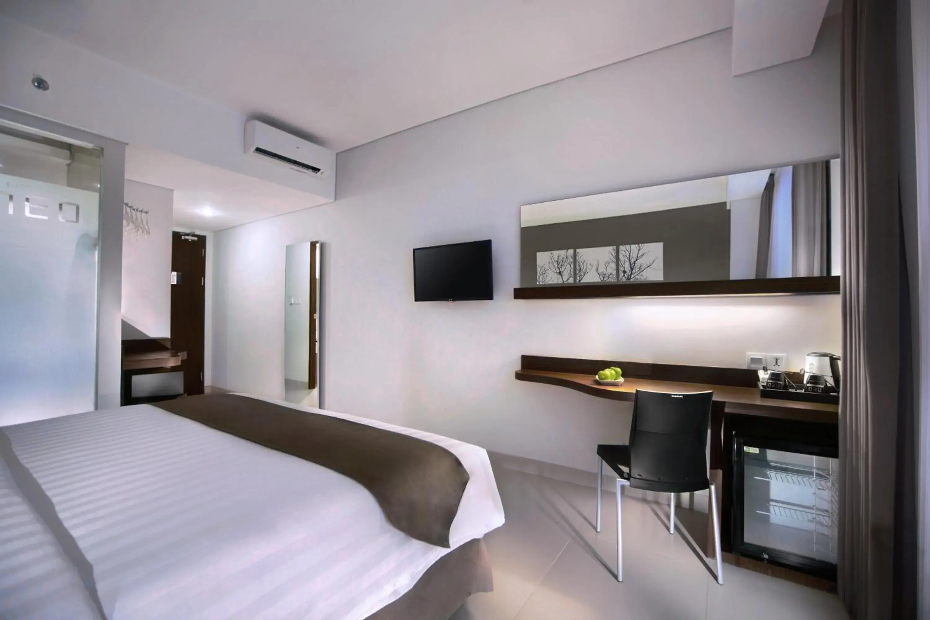 Photo of the whole room, Bed in Neo Denpasar by ASTON Photo of the whole room, Bed in Neo Denpasar by ASTON