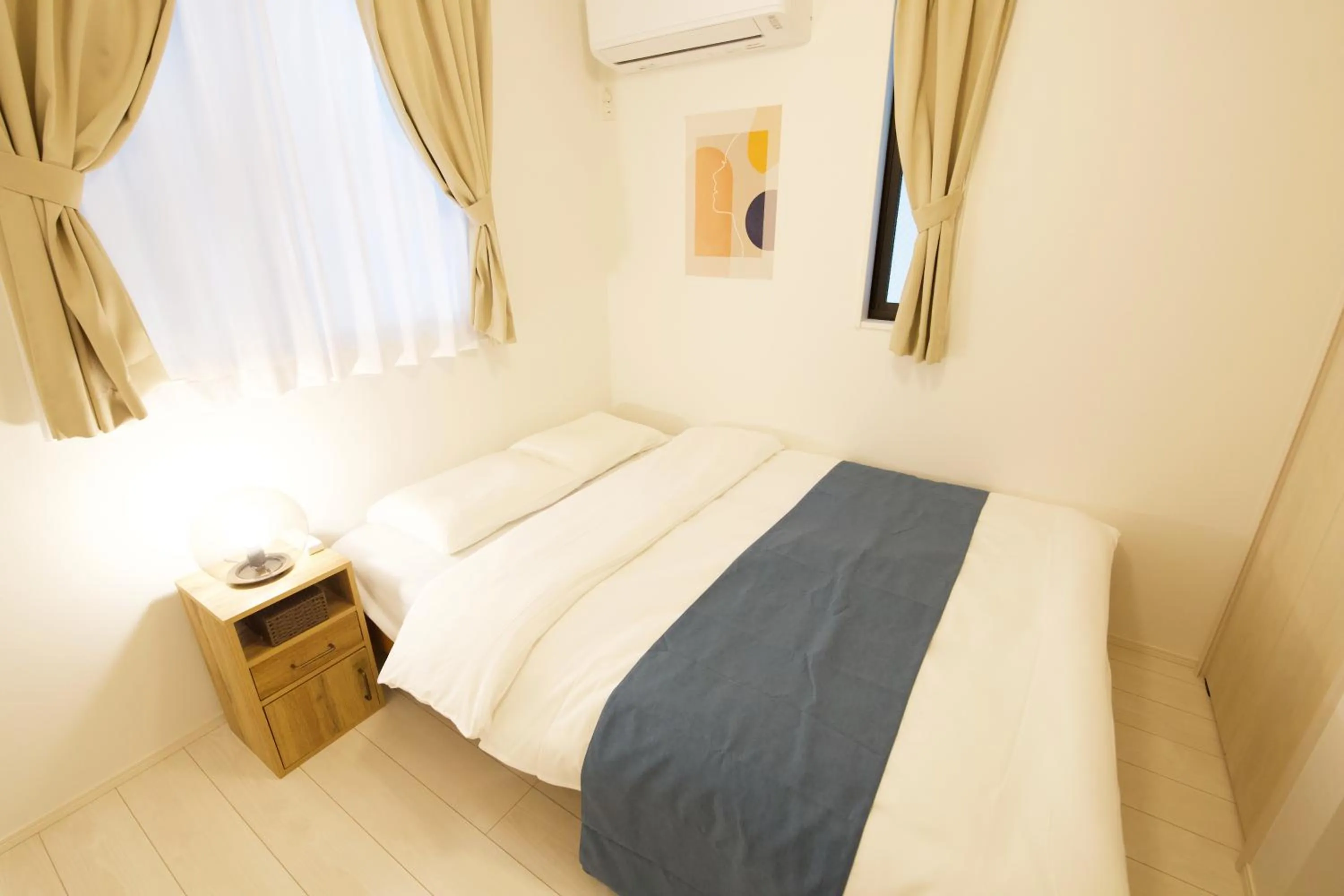 Bed in FINOA Residential Suite Kameari