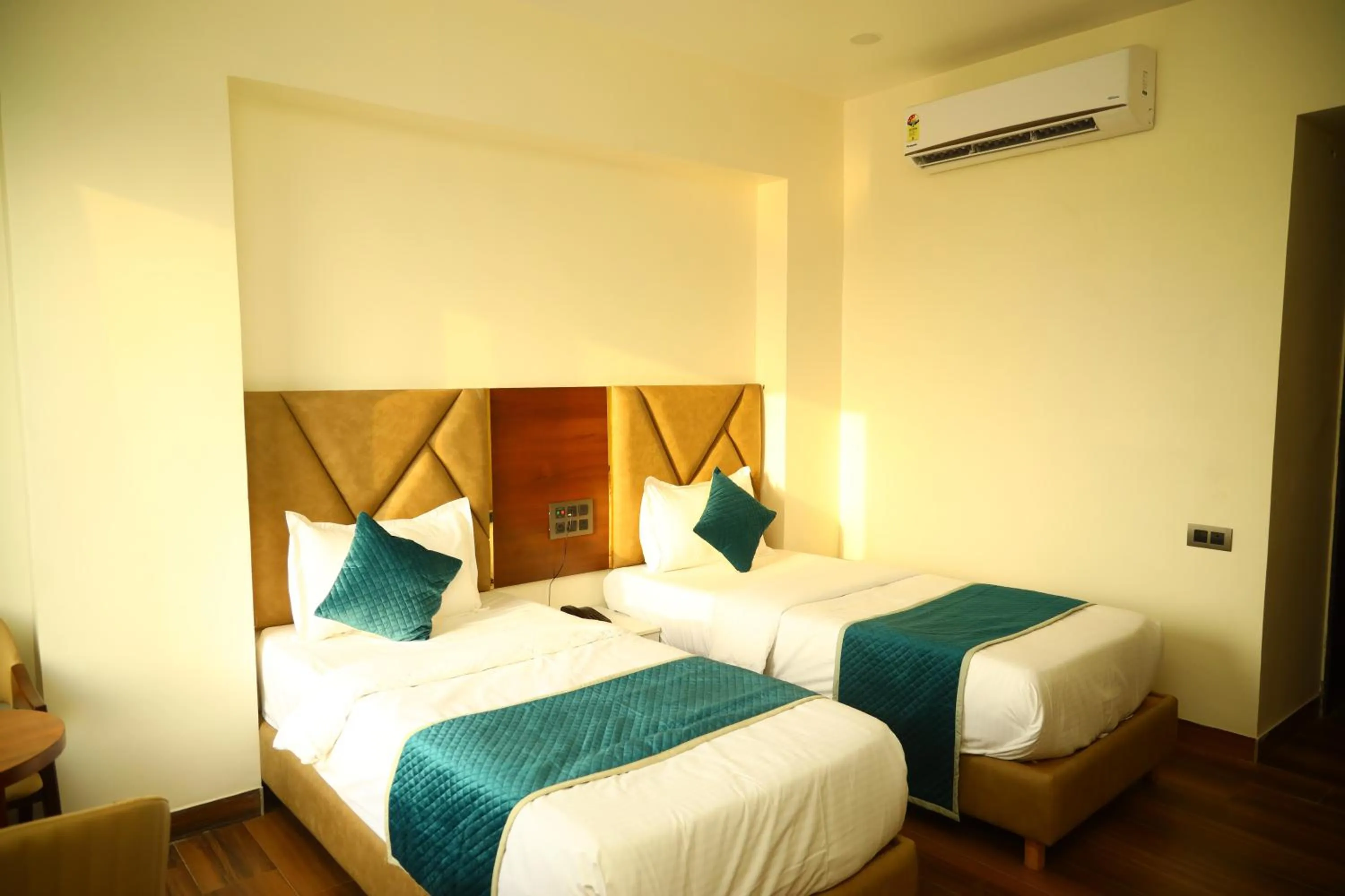 Bed in The Imperial By Vinayak Hotels