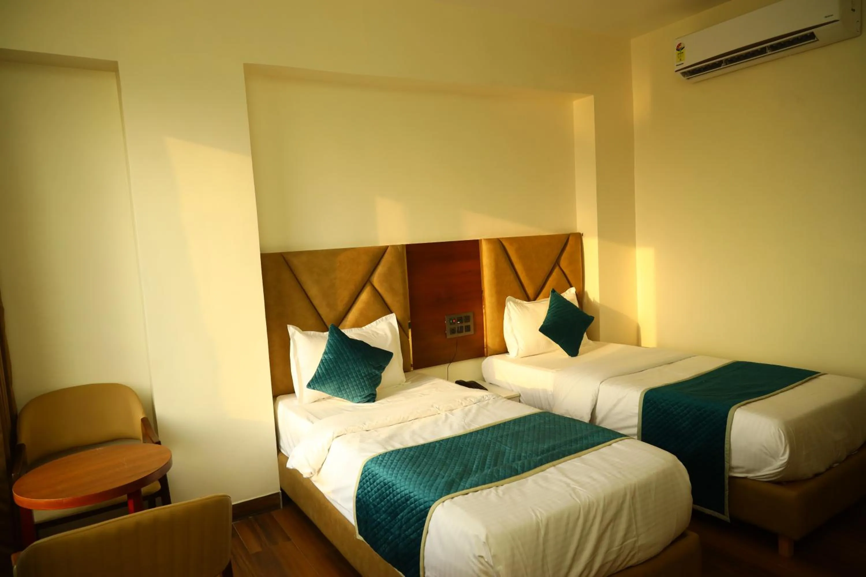 Bedroom in The Imperial By Vinayak Hotels