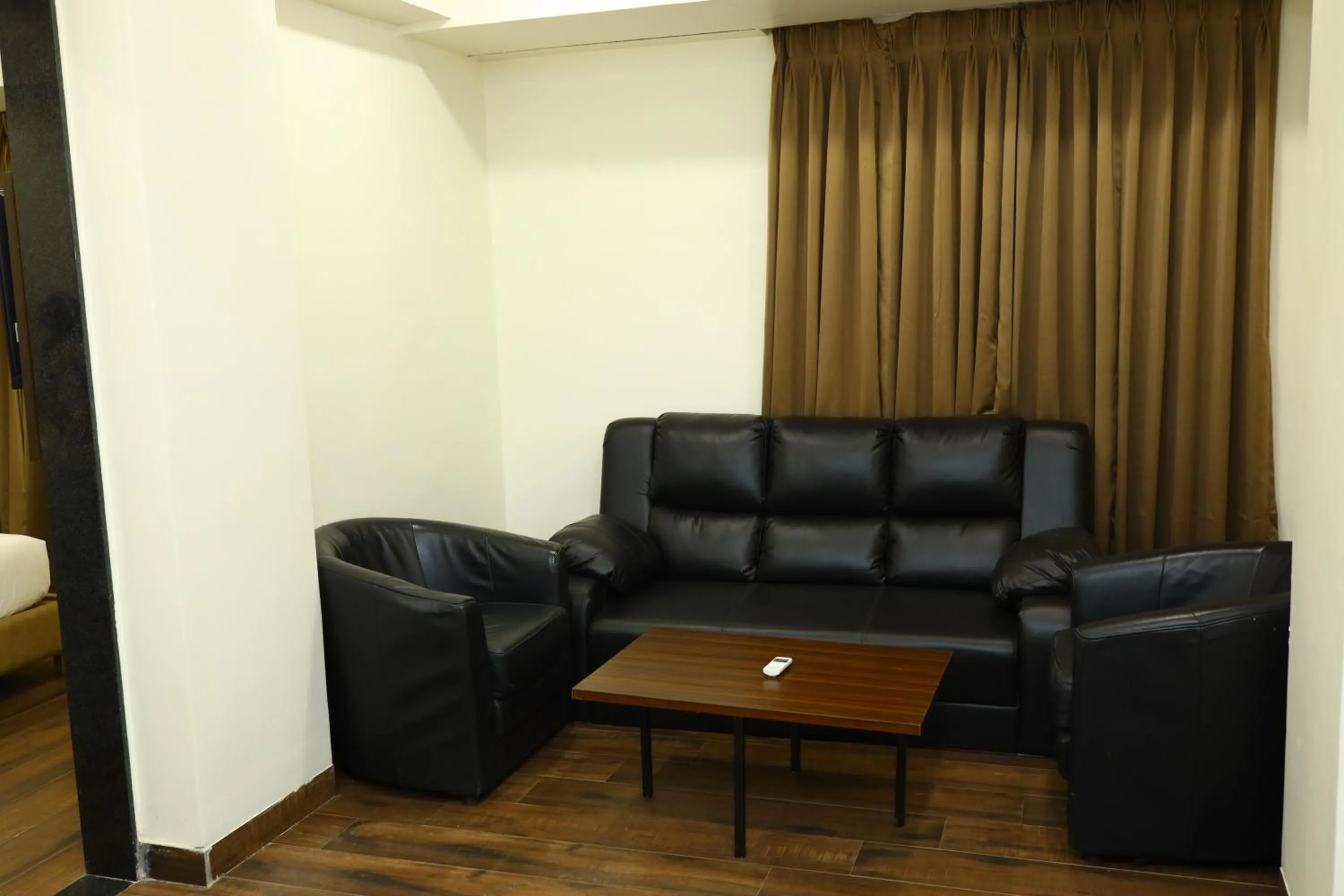Seating area in The Imperial By Vinayak Hotels