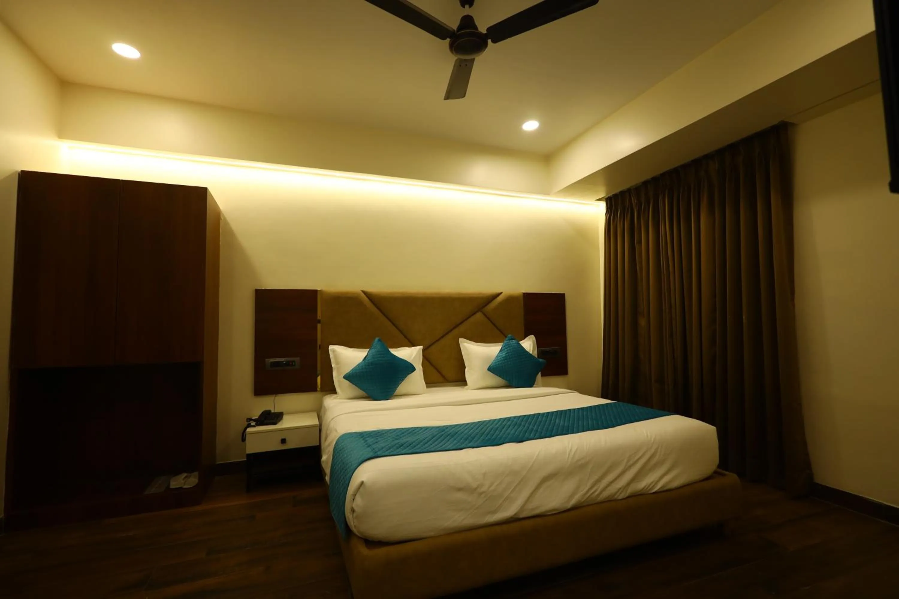 Bed in The Imperial By Vinayak Hotels