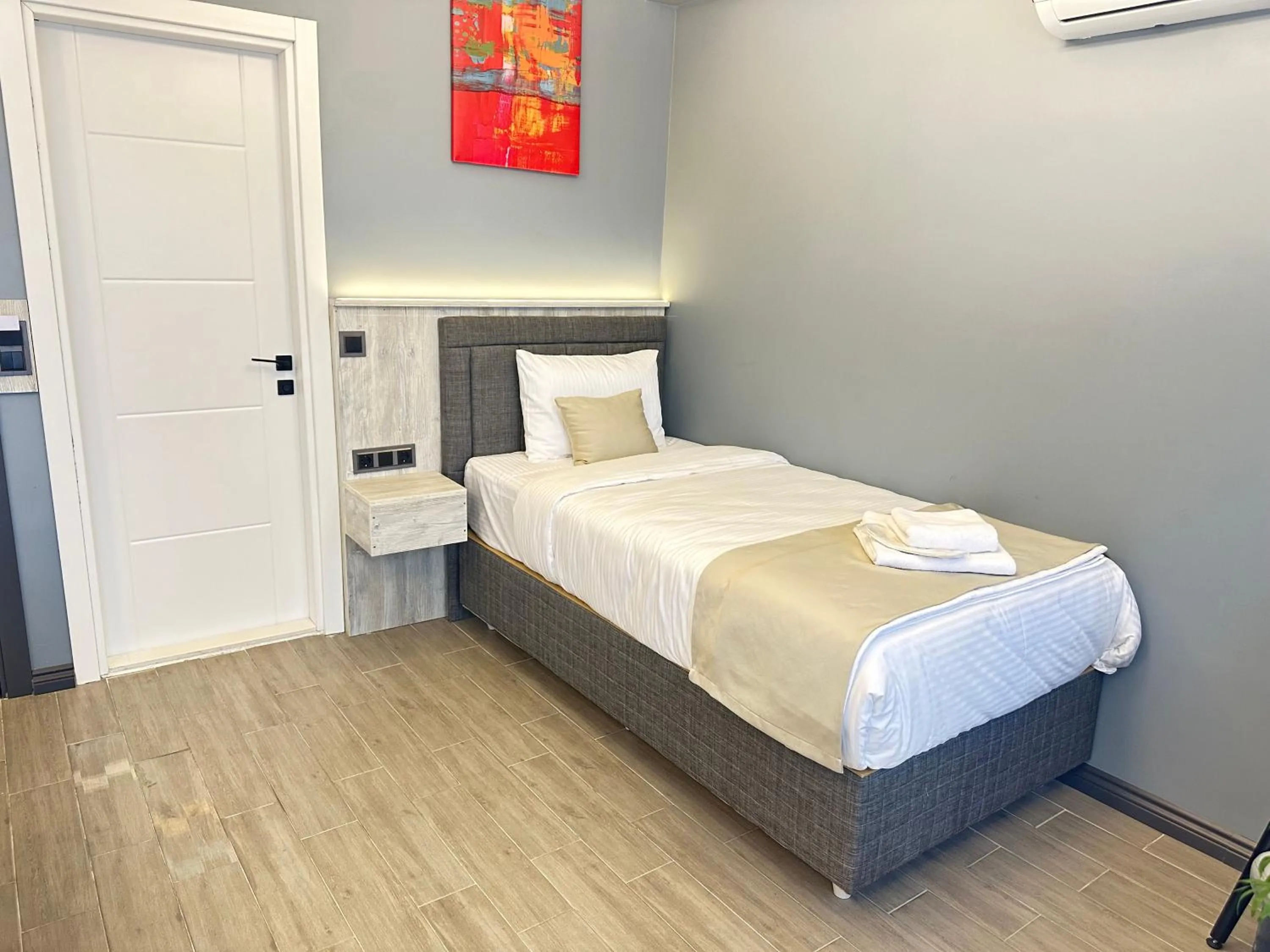 Bed in Blue Moonrise Hotel