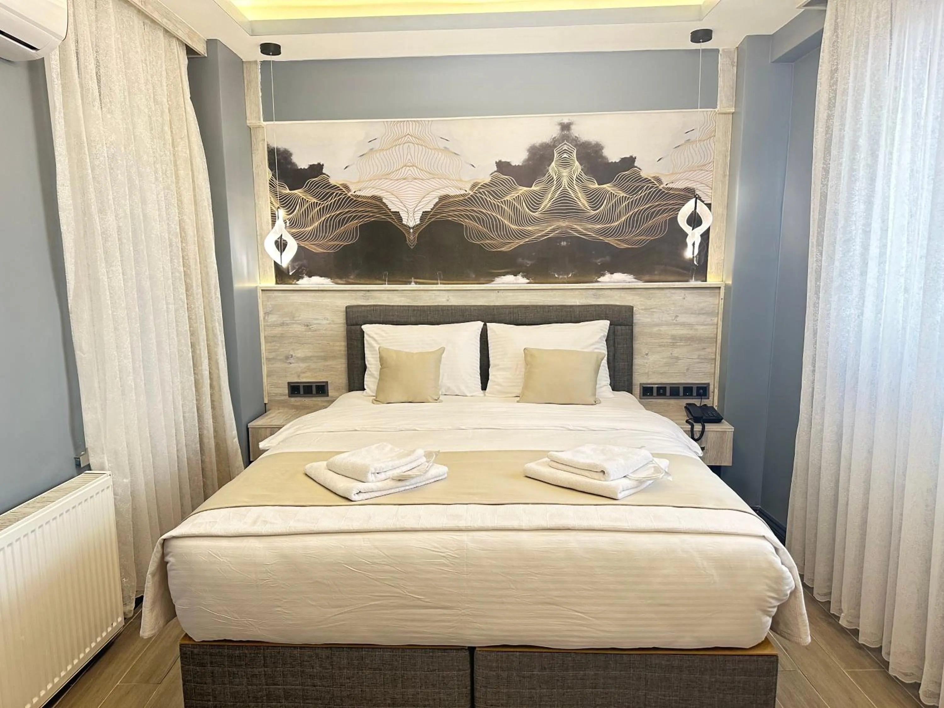 Bed in Blue Moonrise Hotel