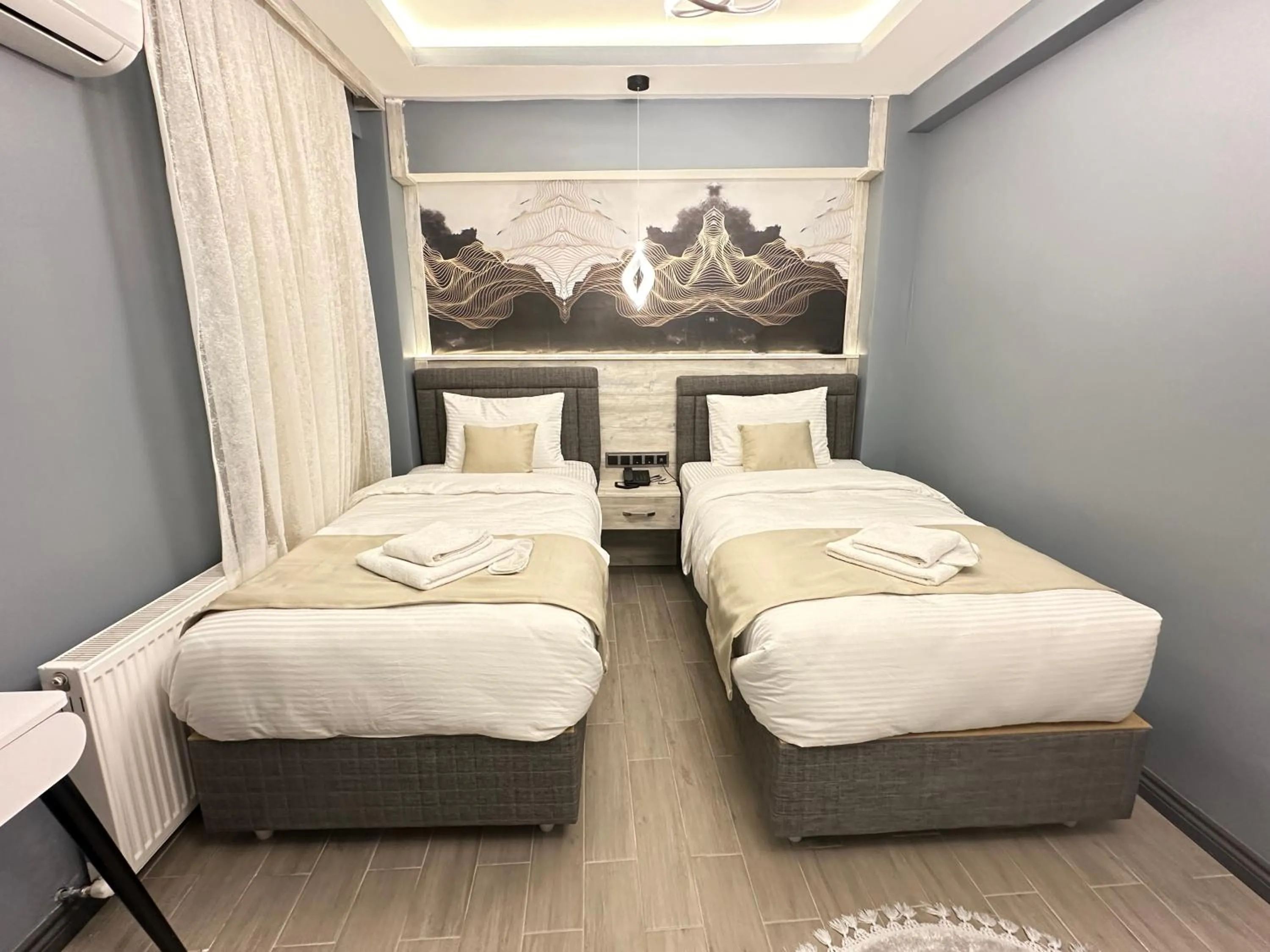 Bed in Blue Moonrise Hotel