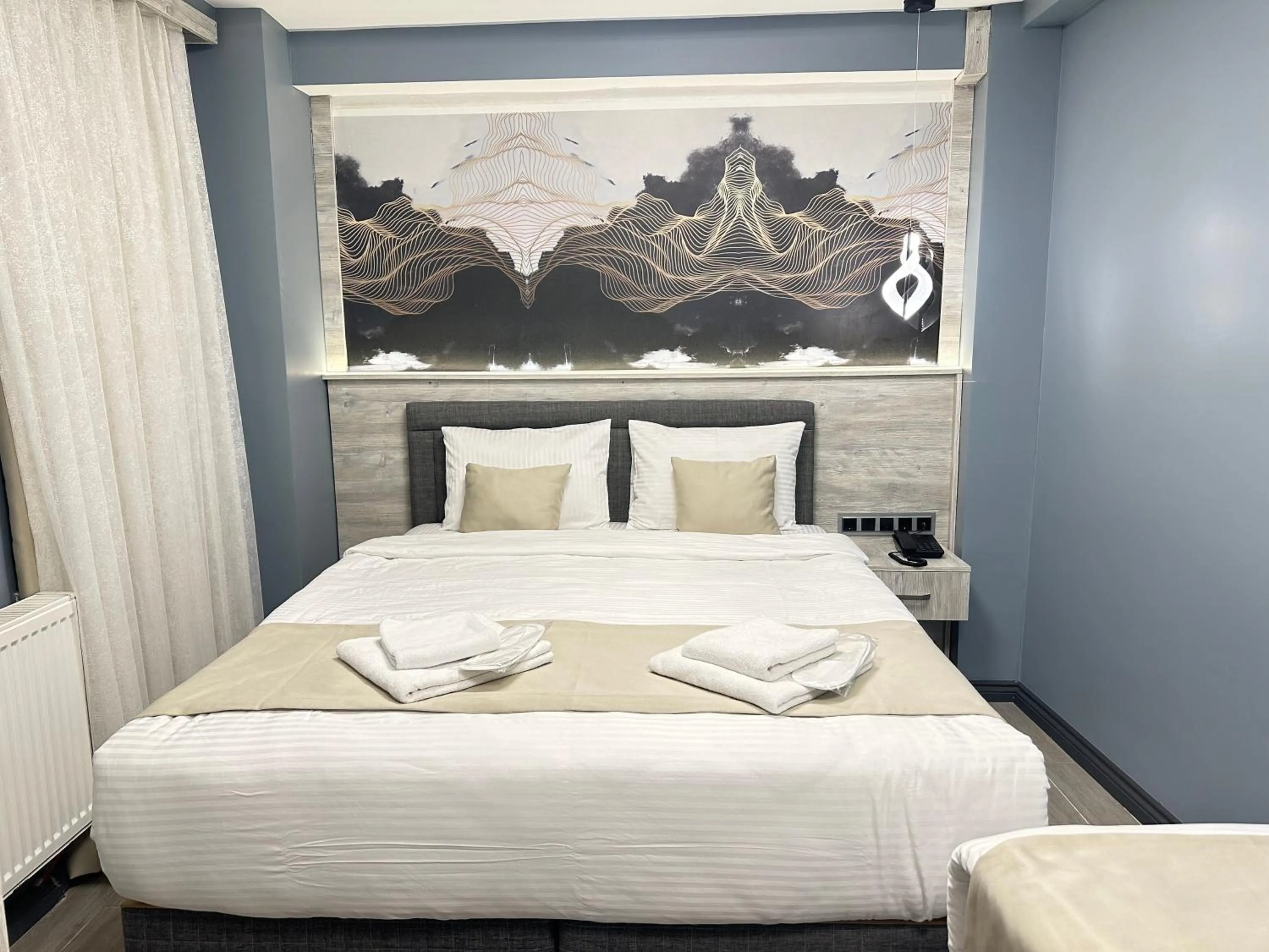 Bed in Blue Moonrise Hotel