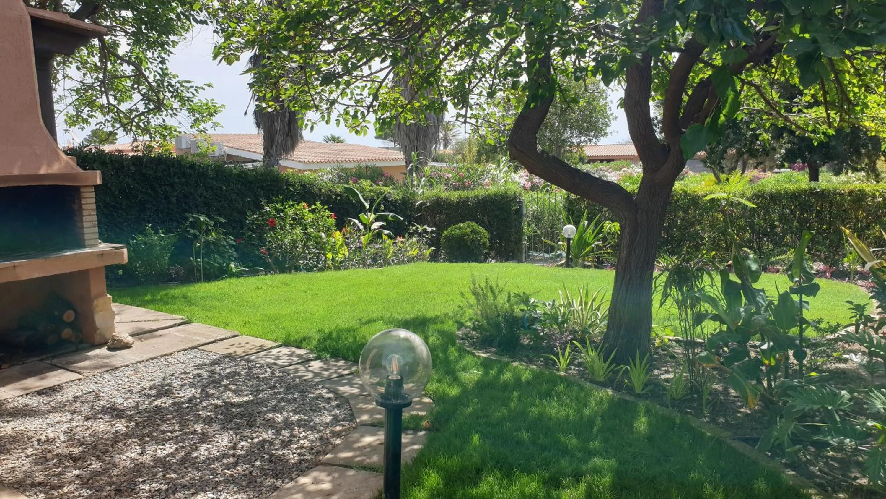 Garden view in Villetta Sunrise 18