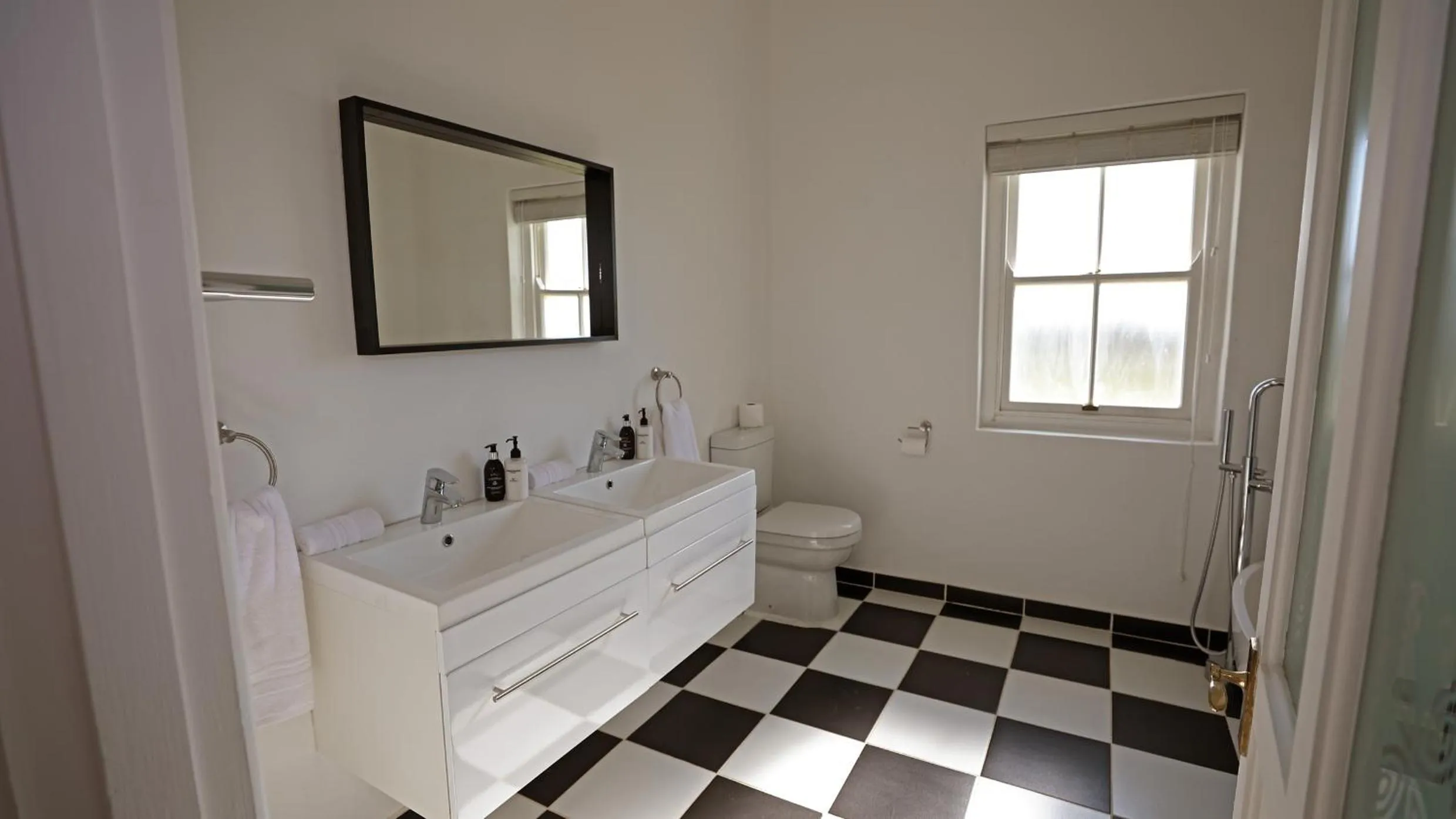 Toilet in RiverBend Lodge