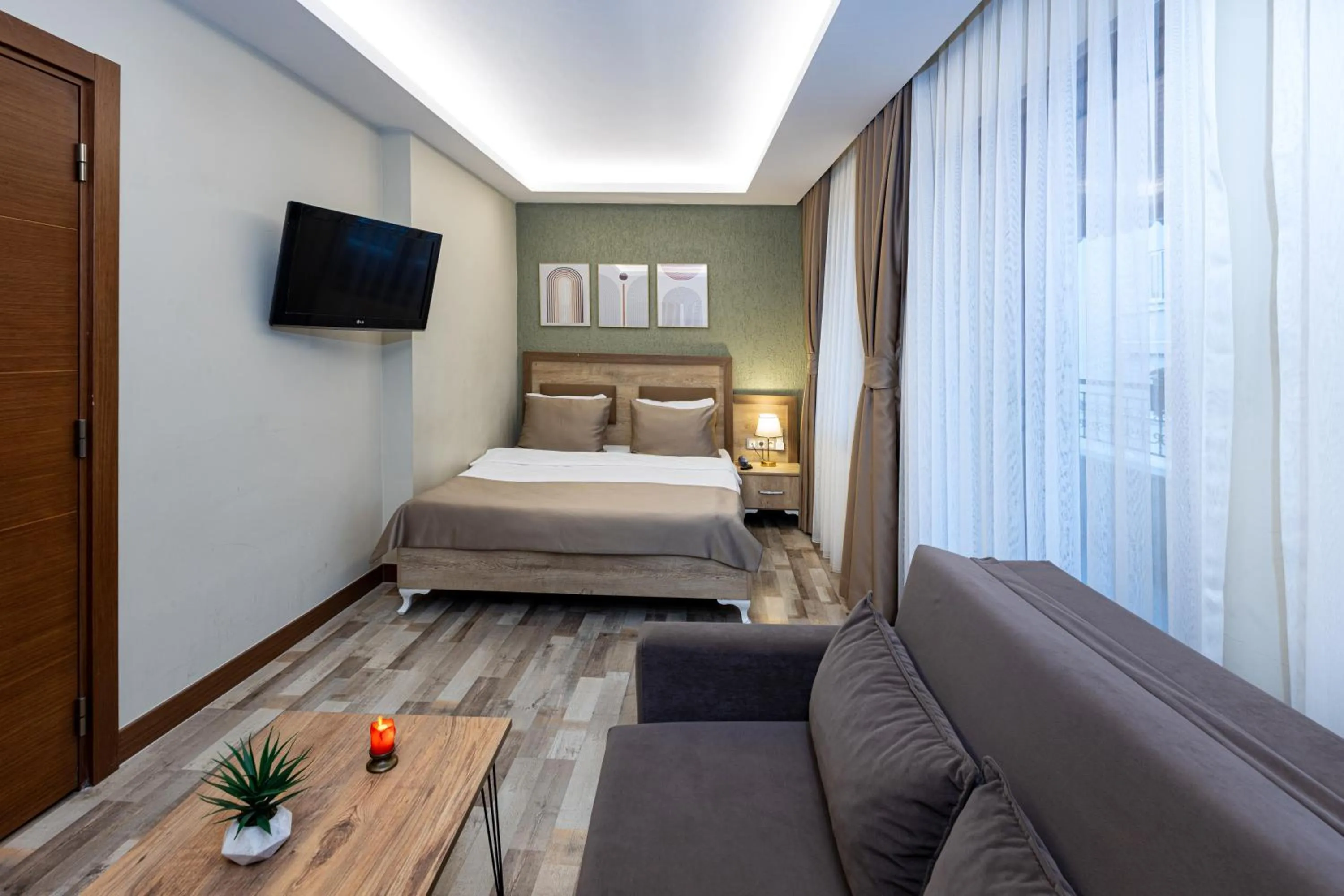 TV and multimedia, Bed in LINNGA HOTEL & SUITE