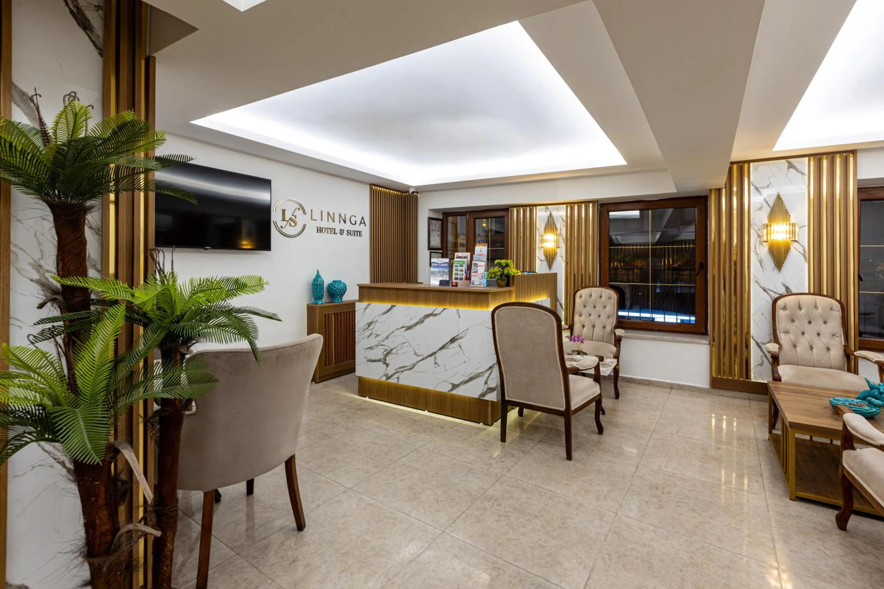 Lobby or reception in LINNGA HOTEL & SUITE