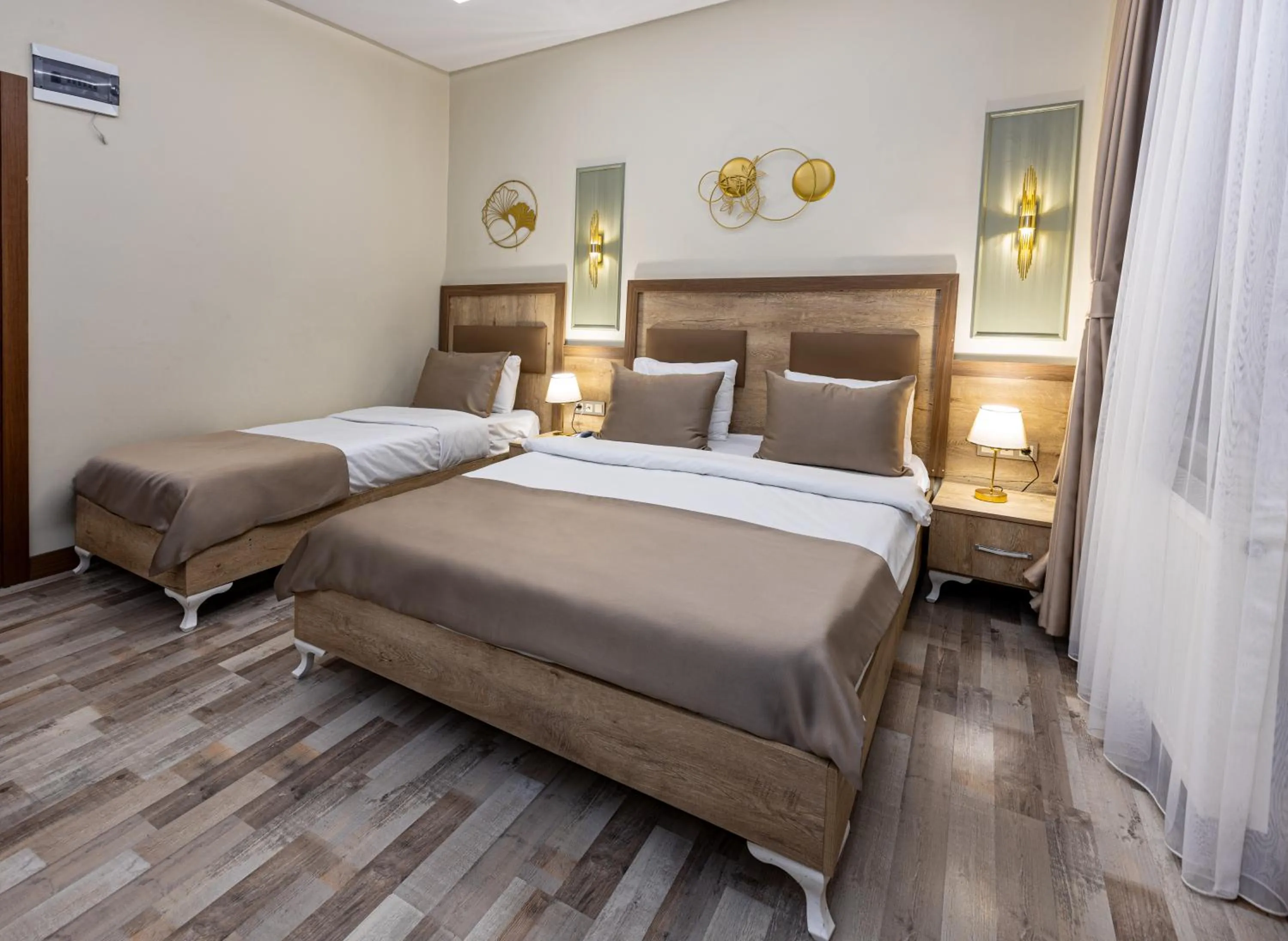 Bed in LINNGA HOTEL & SUITE