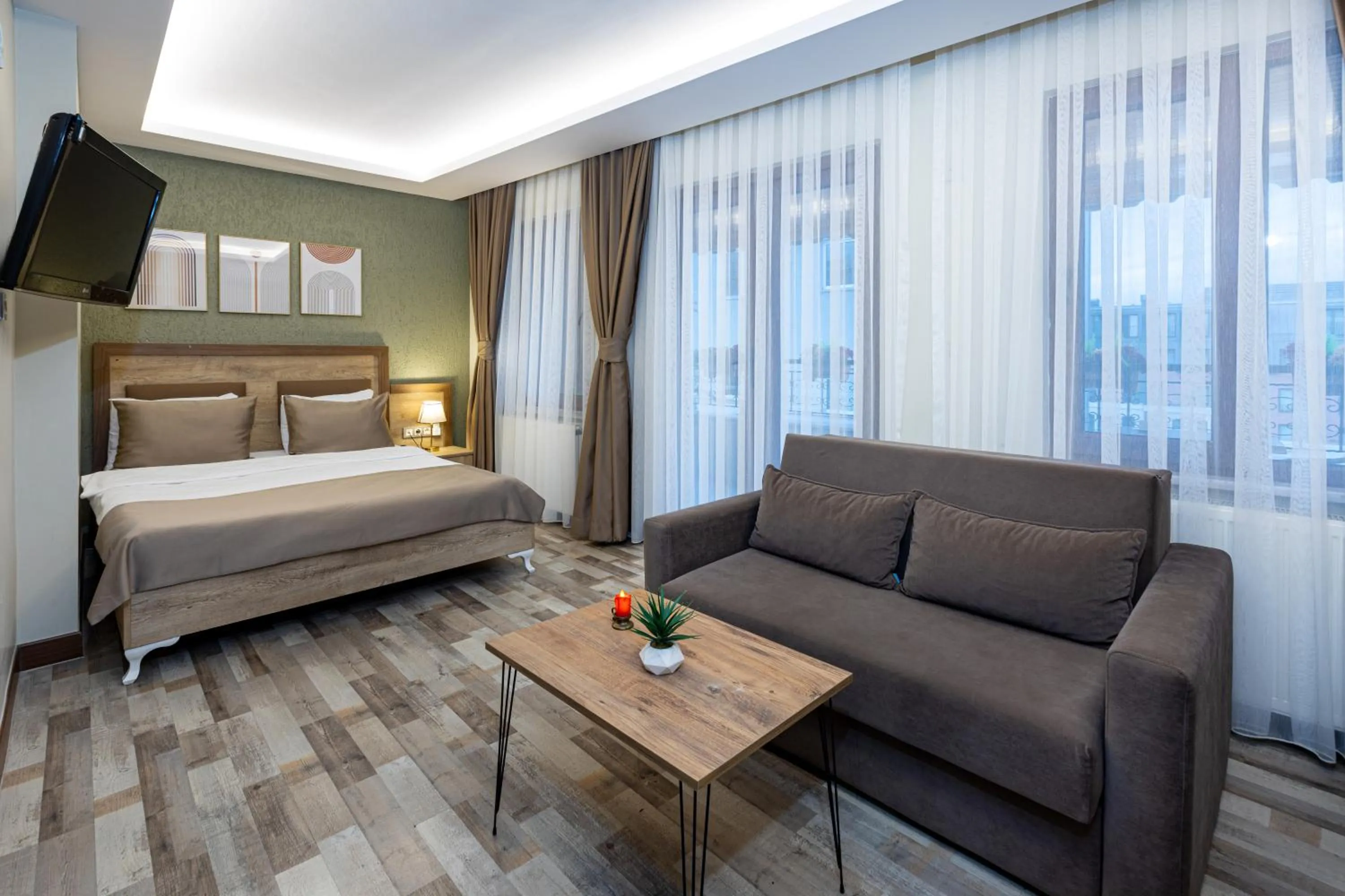 Bed in LINNGA HOTEL & SUITE