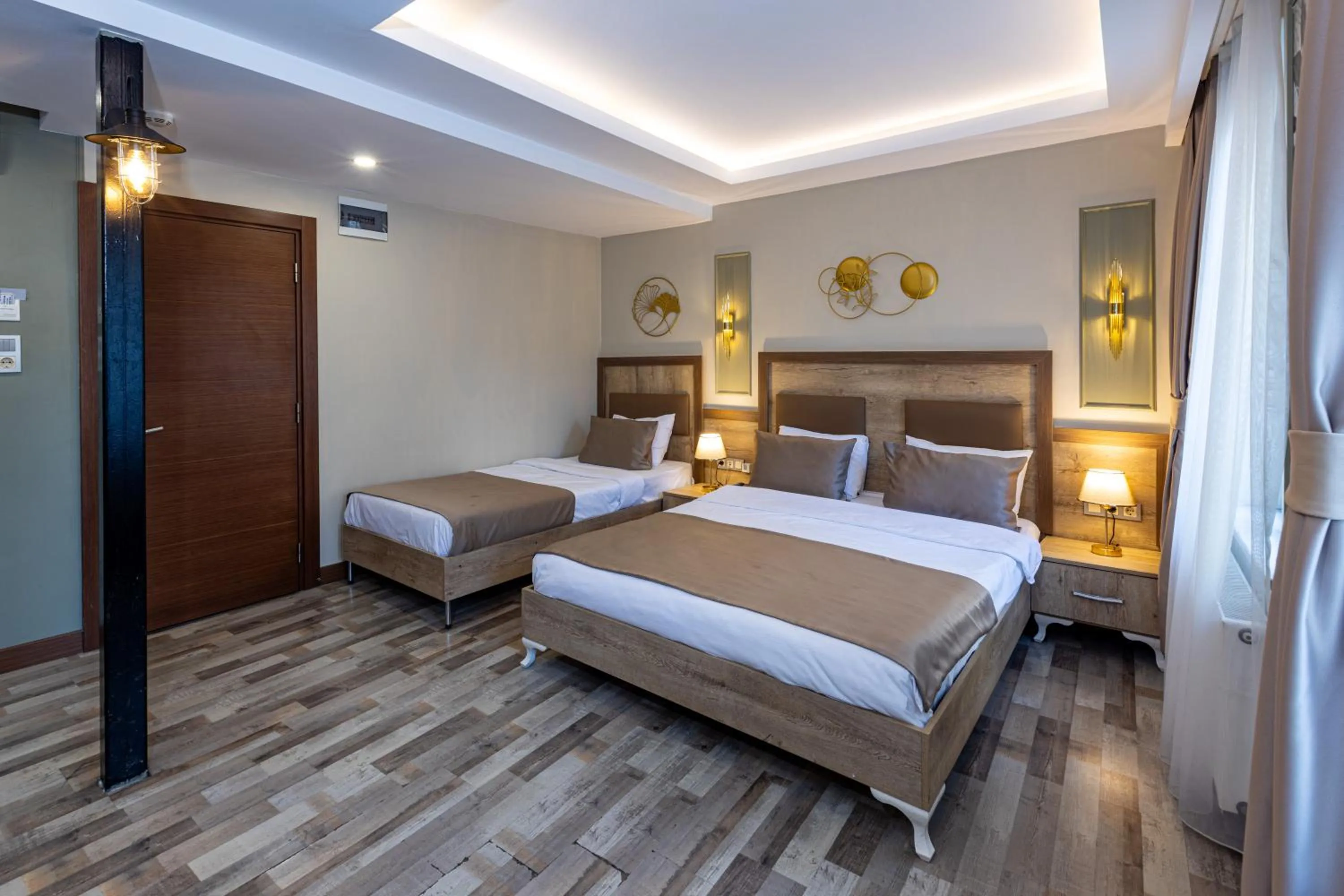 Bed in LINNGA HOTEL & SUITE