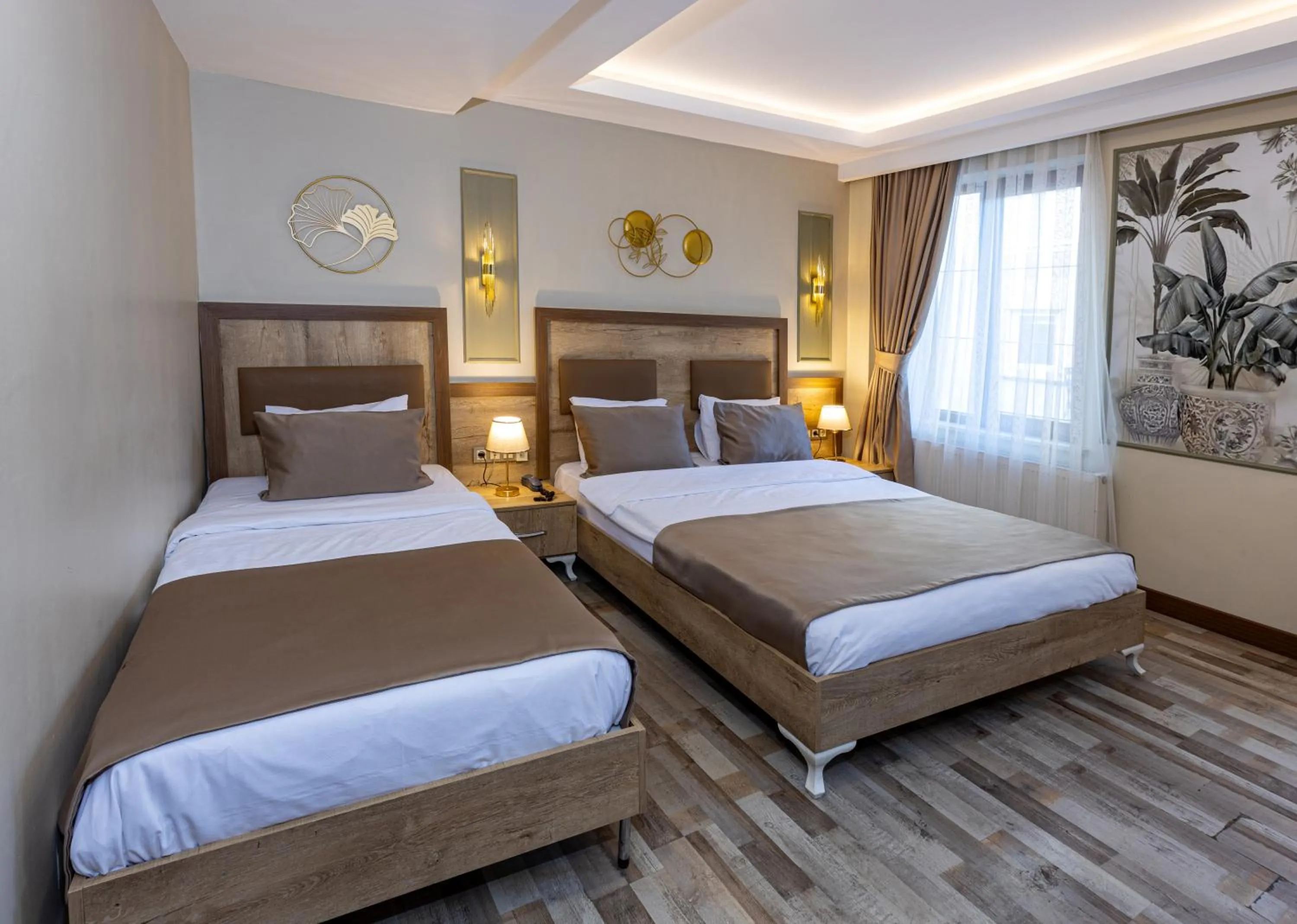 Bed in LINNGA HOTEL & SUITE