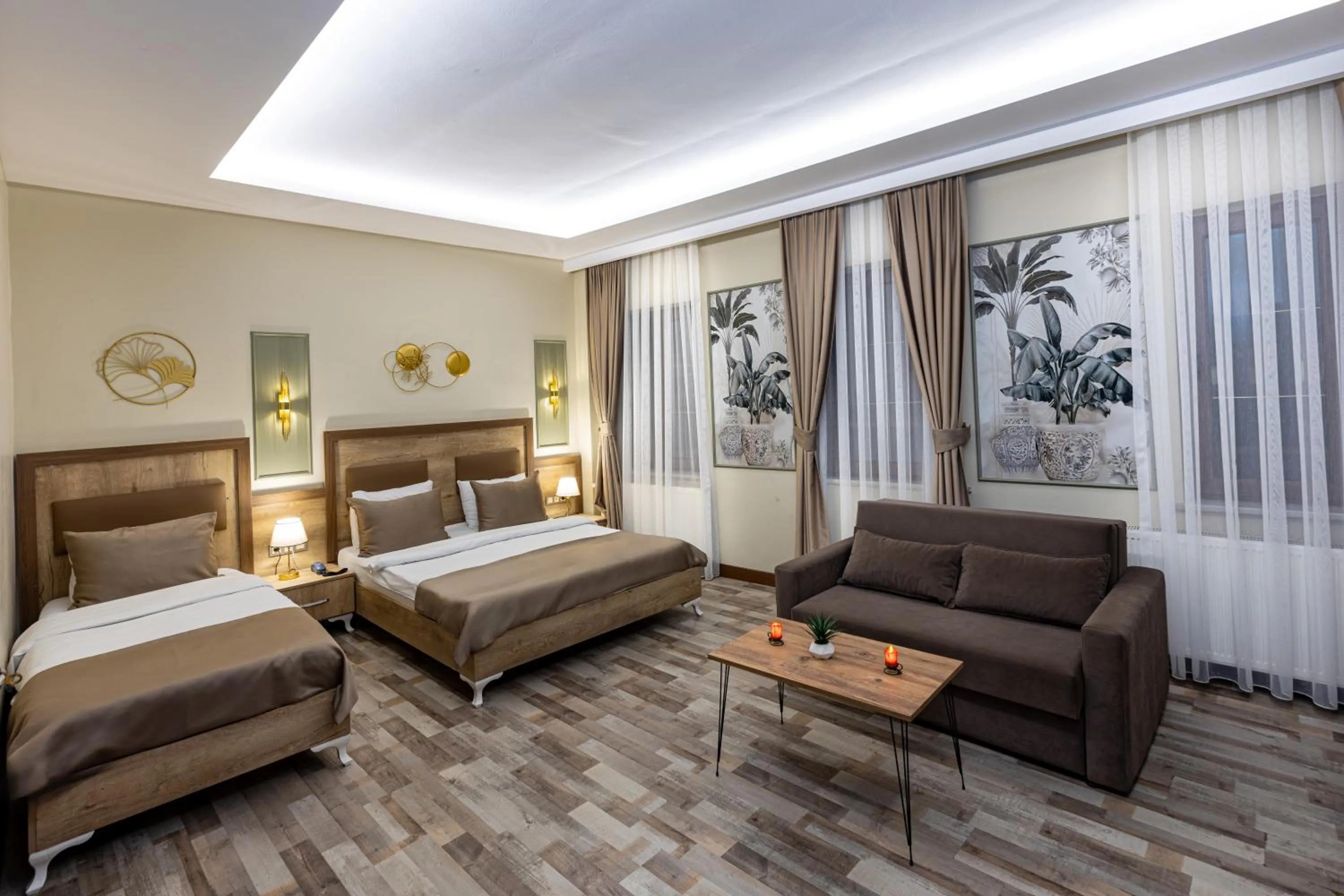 Bed in LINNGA HOTEL & SUITE