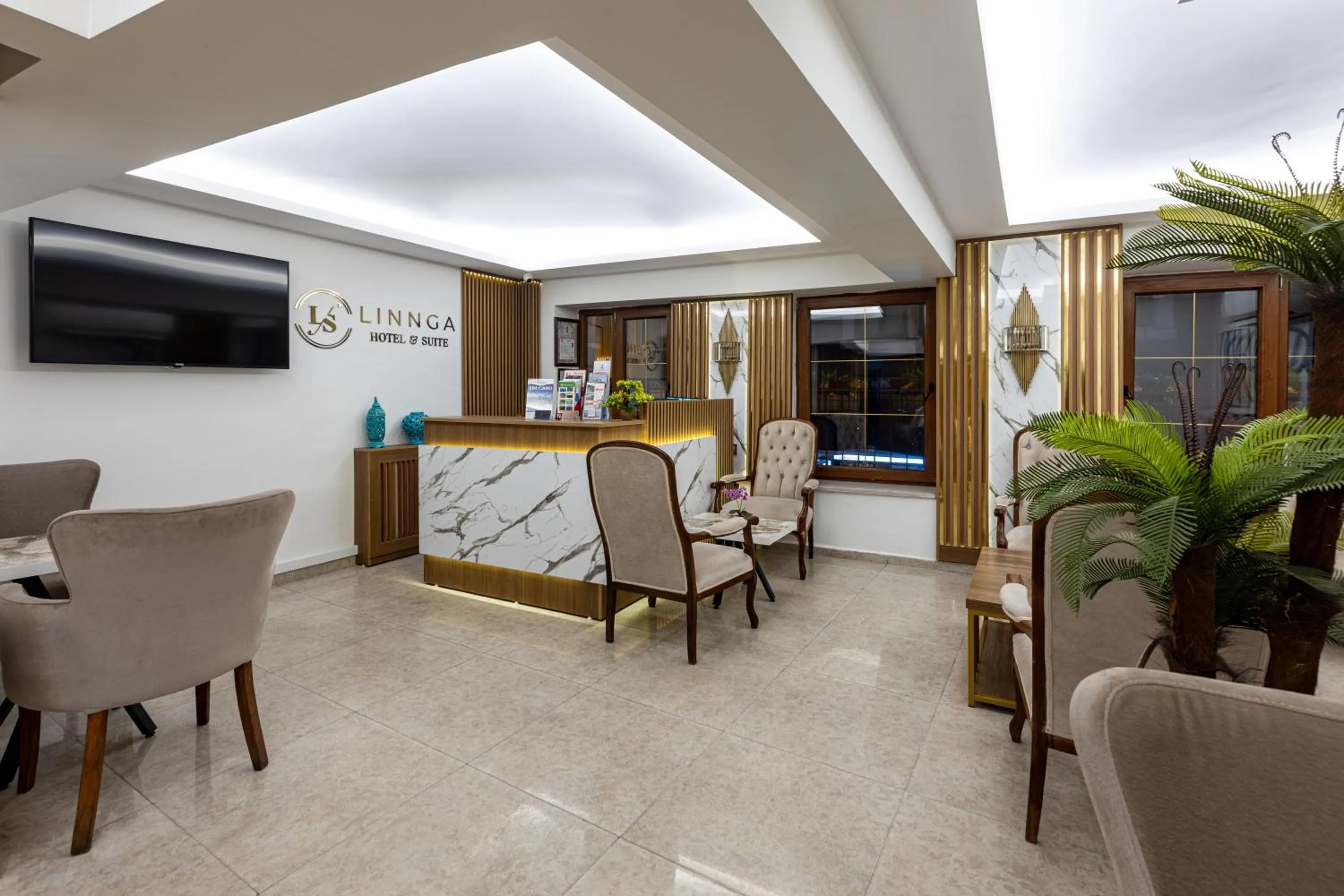 Lobby or reception in LINNGA HOTEL & SUITE