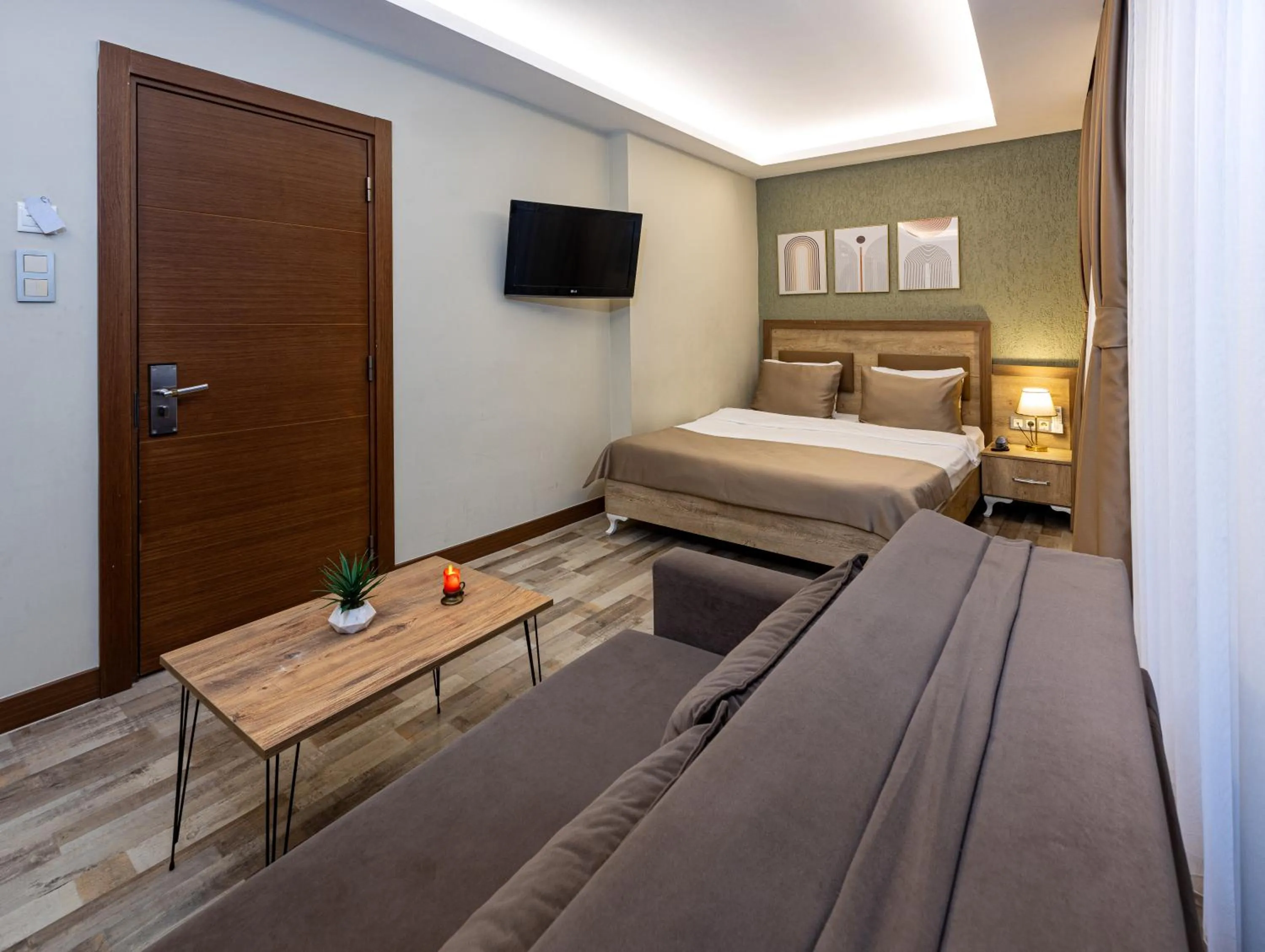 Bed in LINNGA HOTEL & SUITE