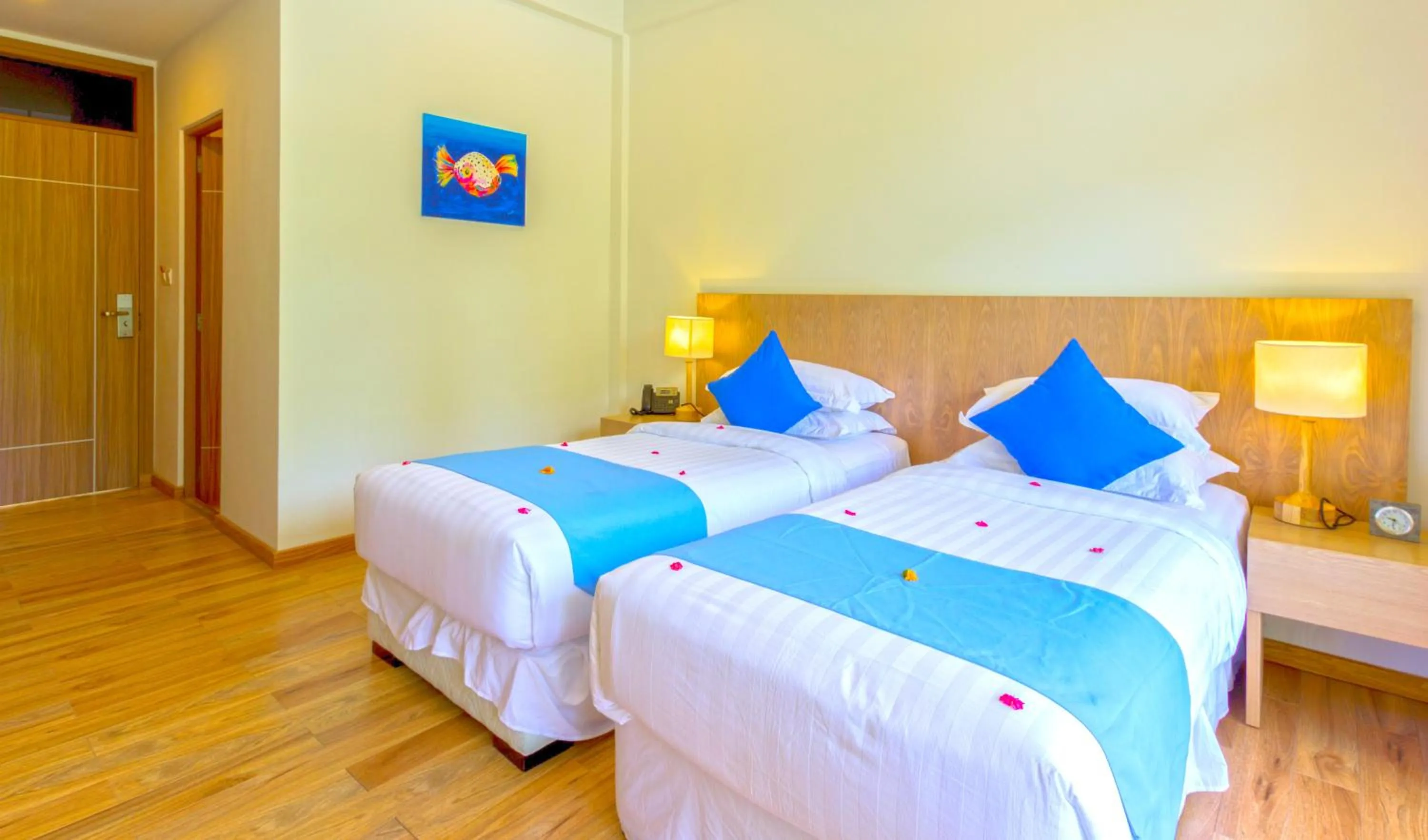 Bed in Plumeria Maldives