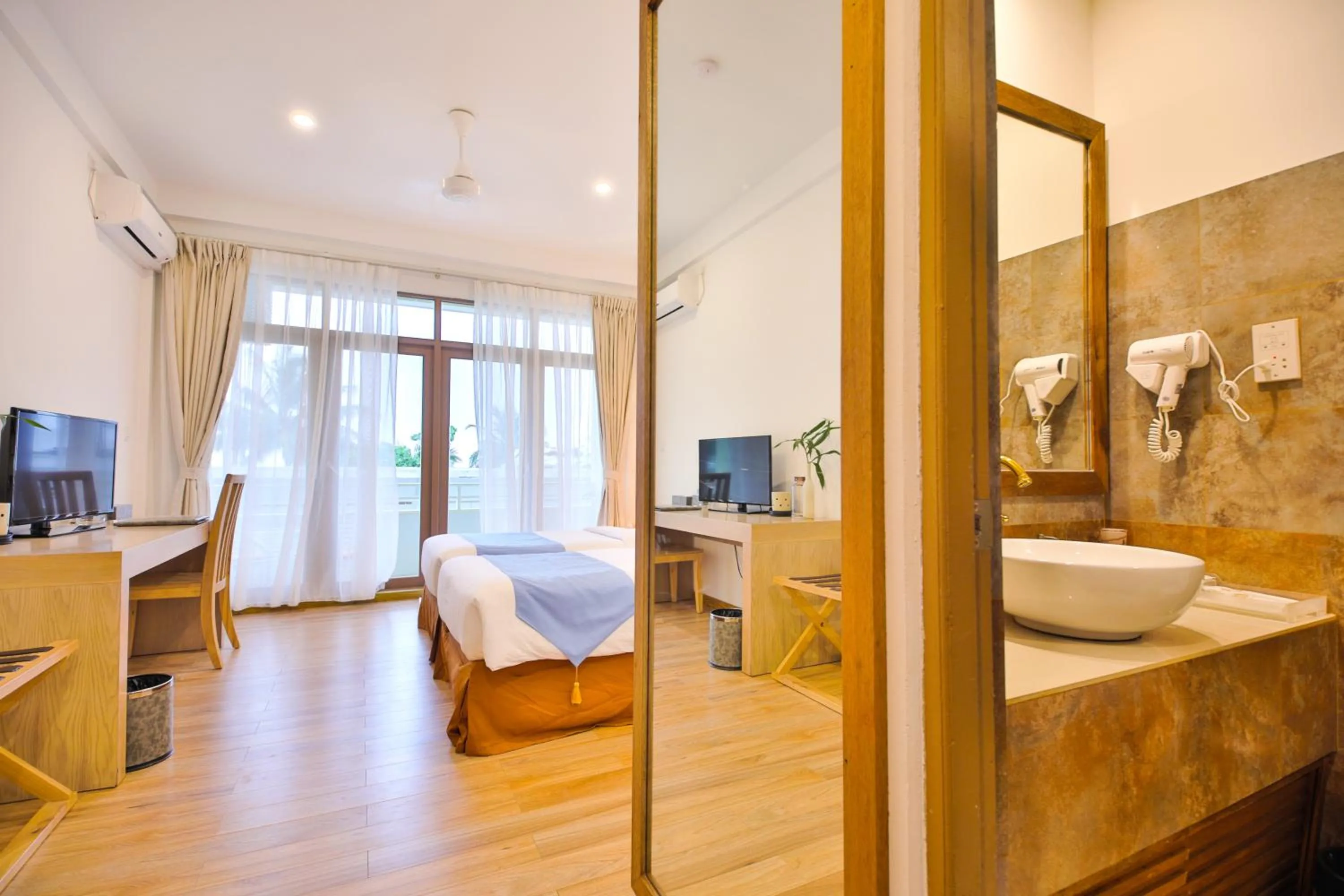 Bed in Plumeria Maldives