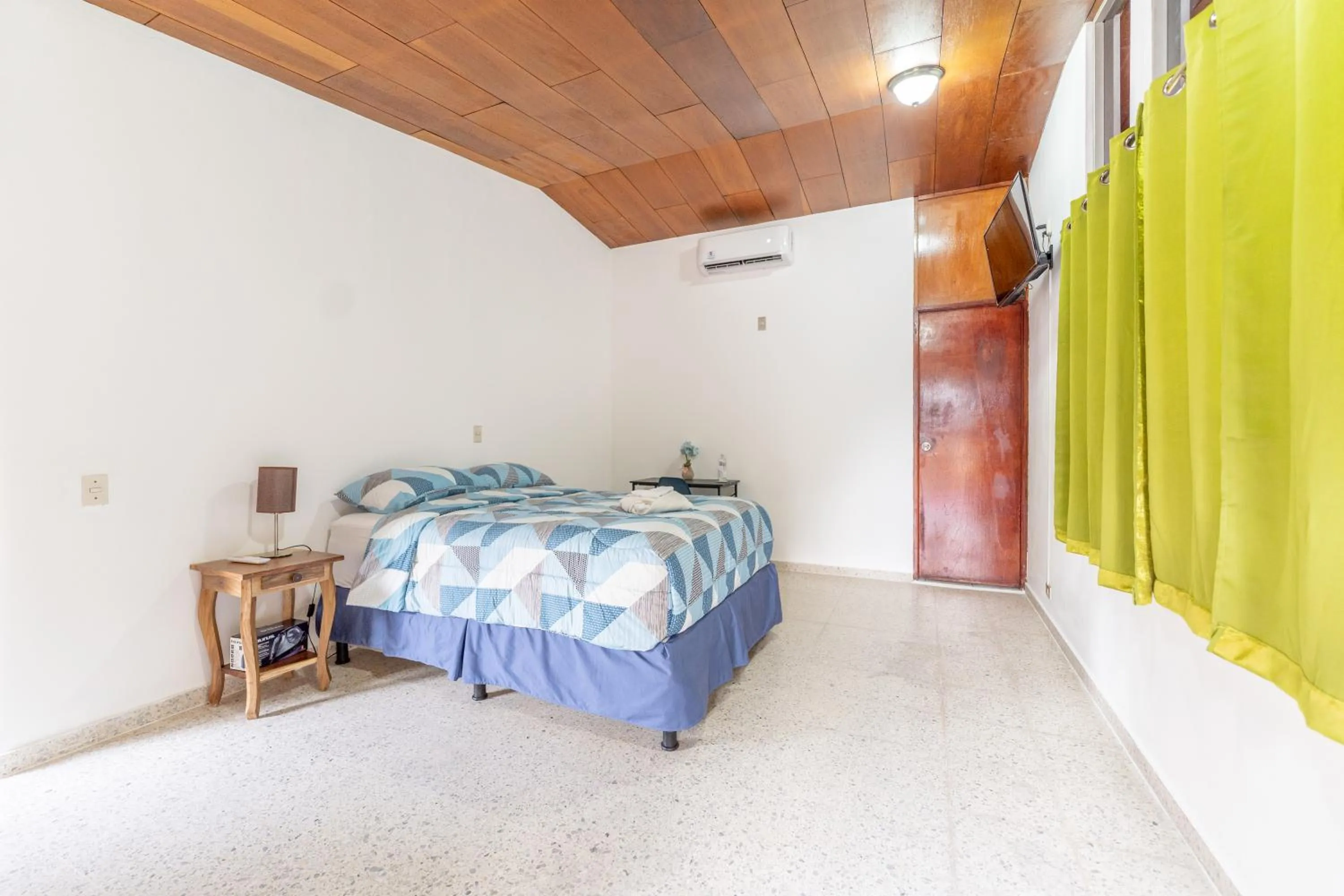 Bedroom, Bed in Volcano Hostal y Restaurante