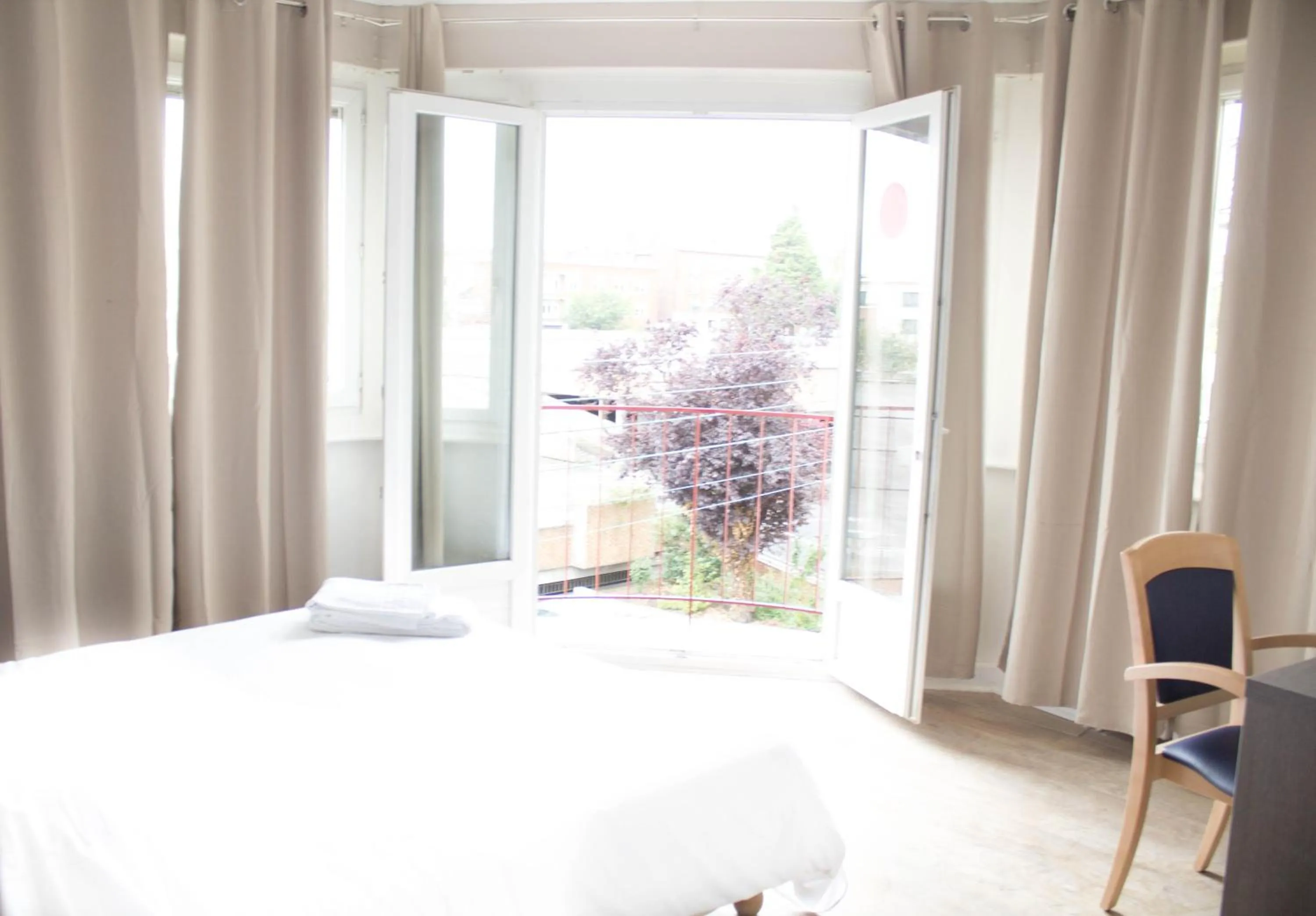 Bed in Hotel Le Jardin