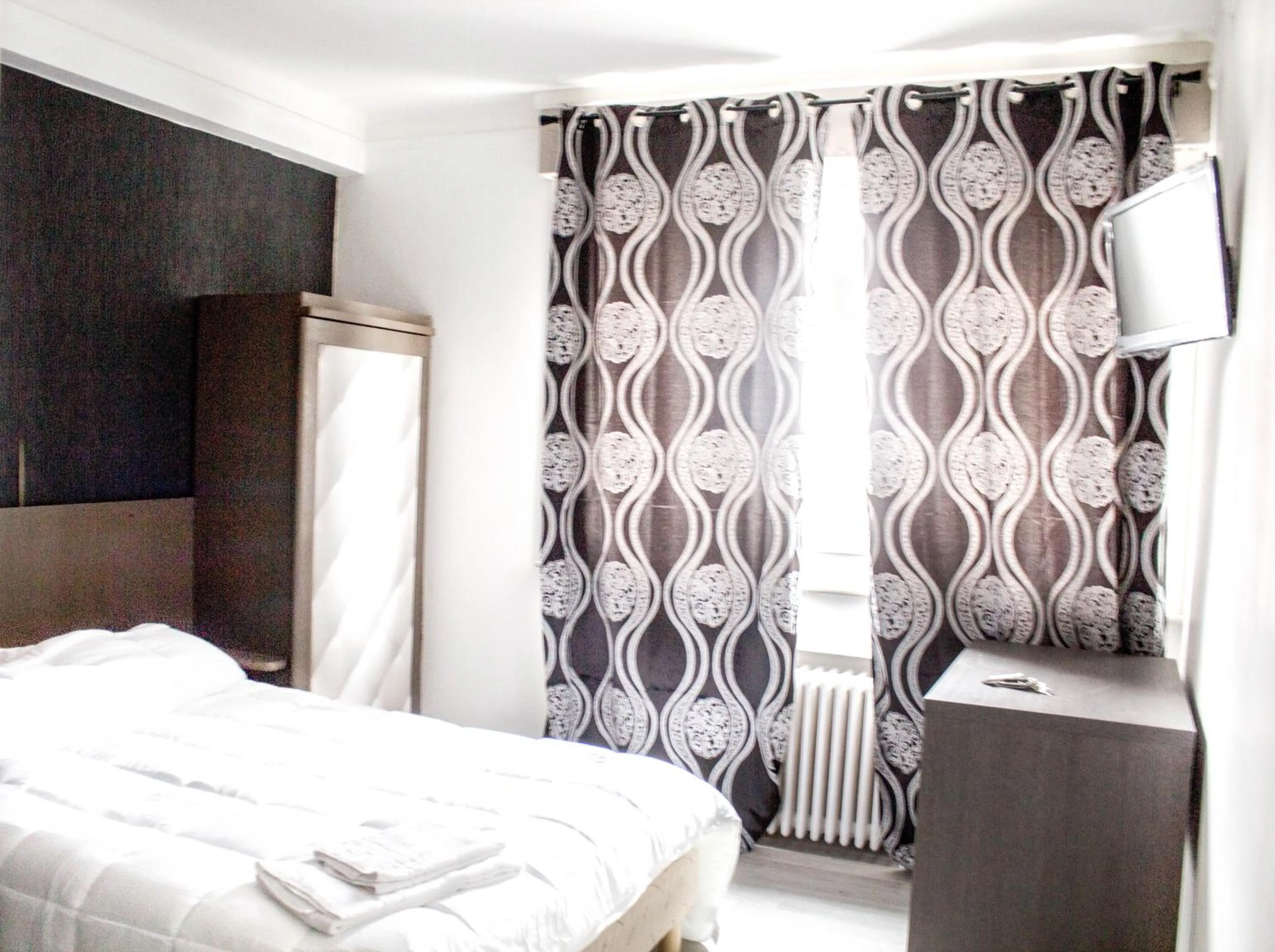 Bed in Hotel Le Jardin