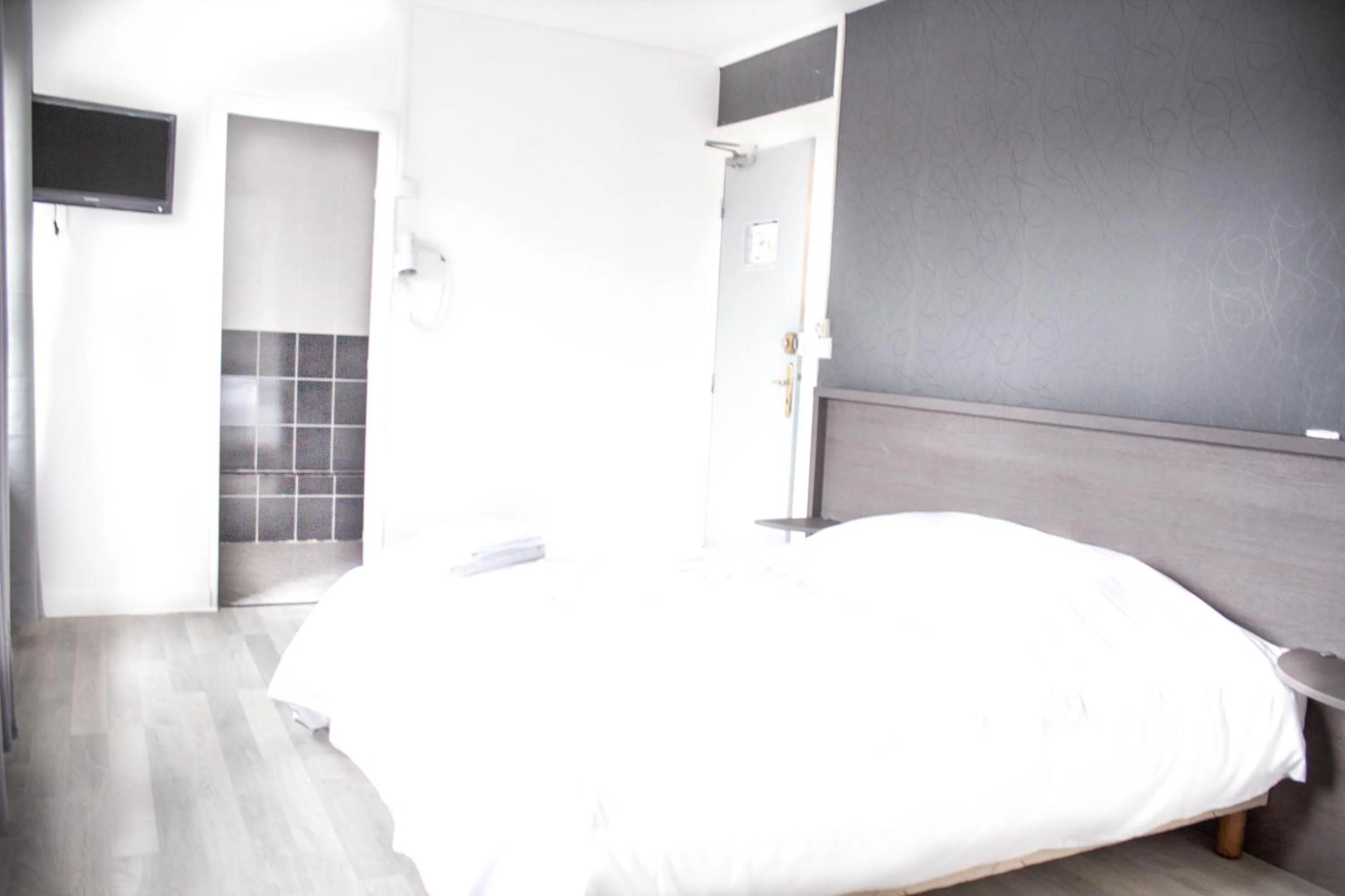 Bed in Hotel Le Jardin