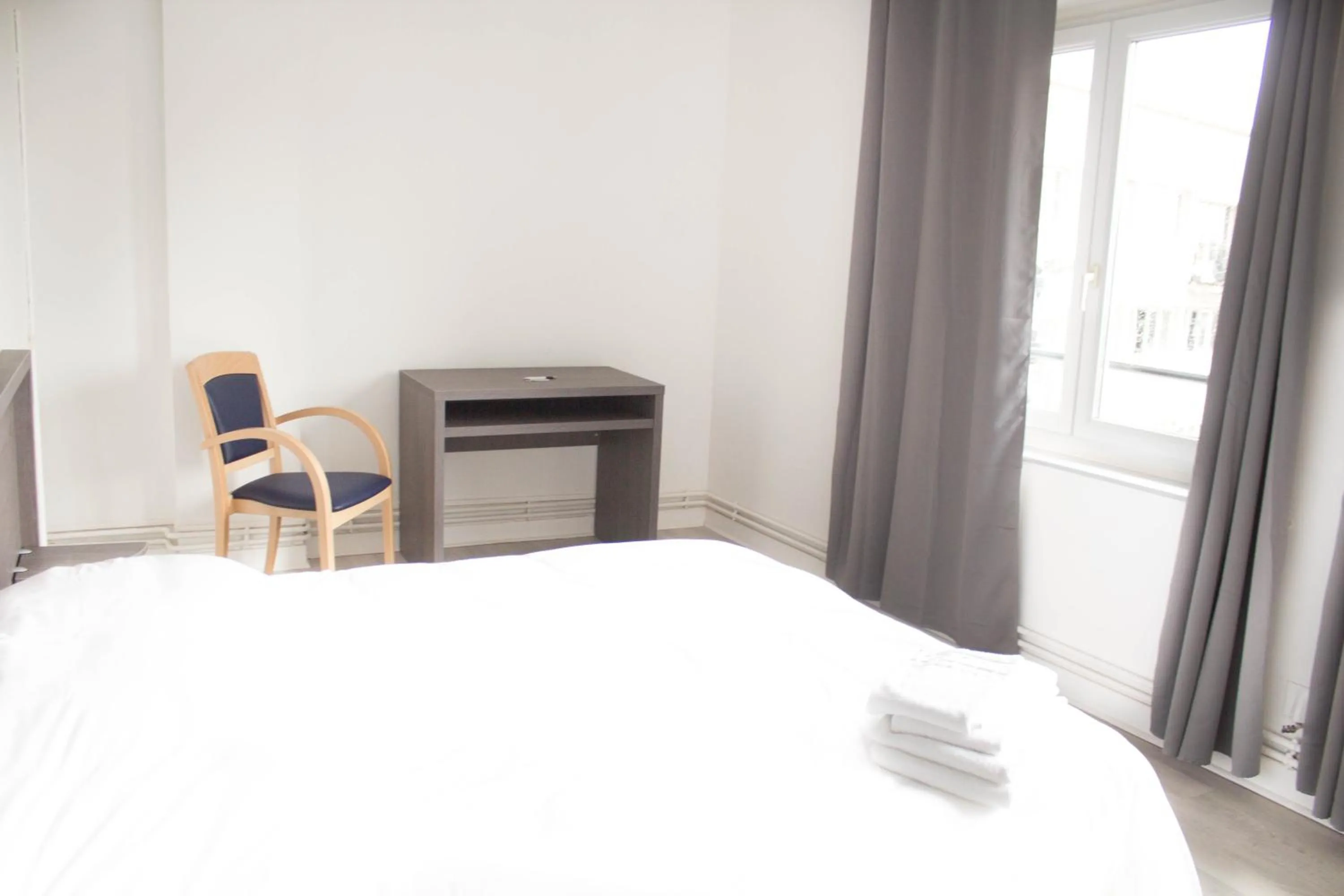 Bed in Hotel Le Jardin