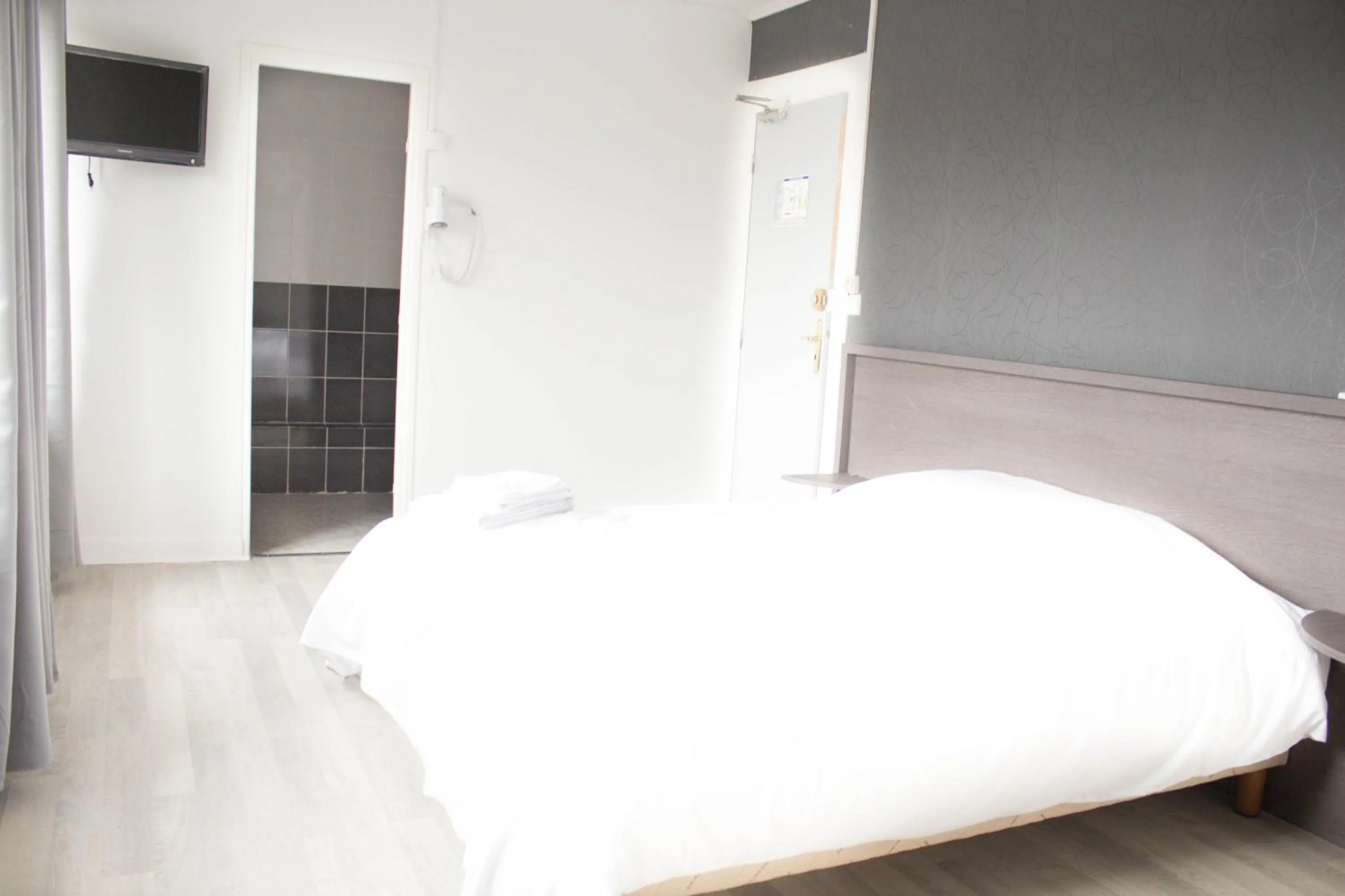 Bed in Hotel Le Jardin