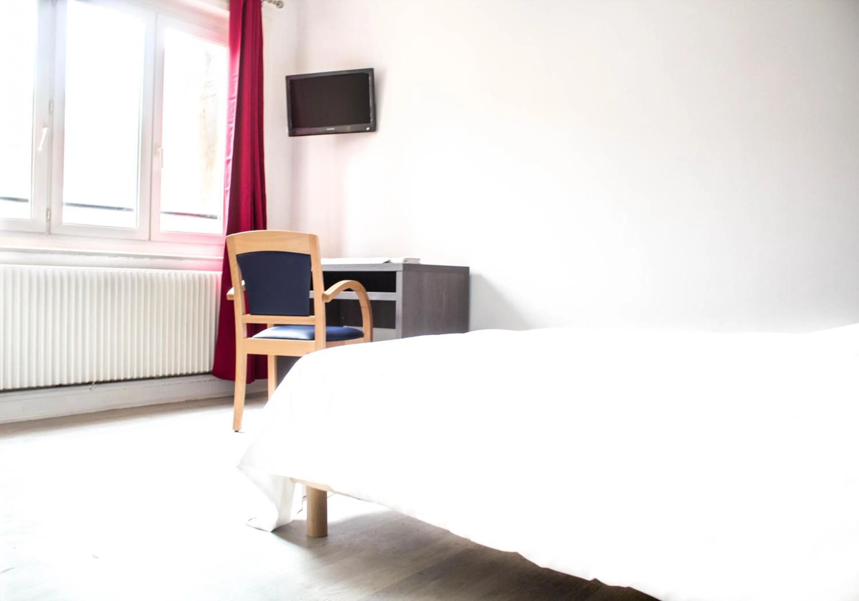 Bed in Hotel Le Jardin