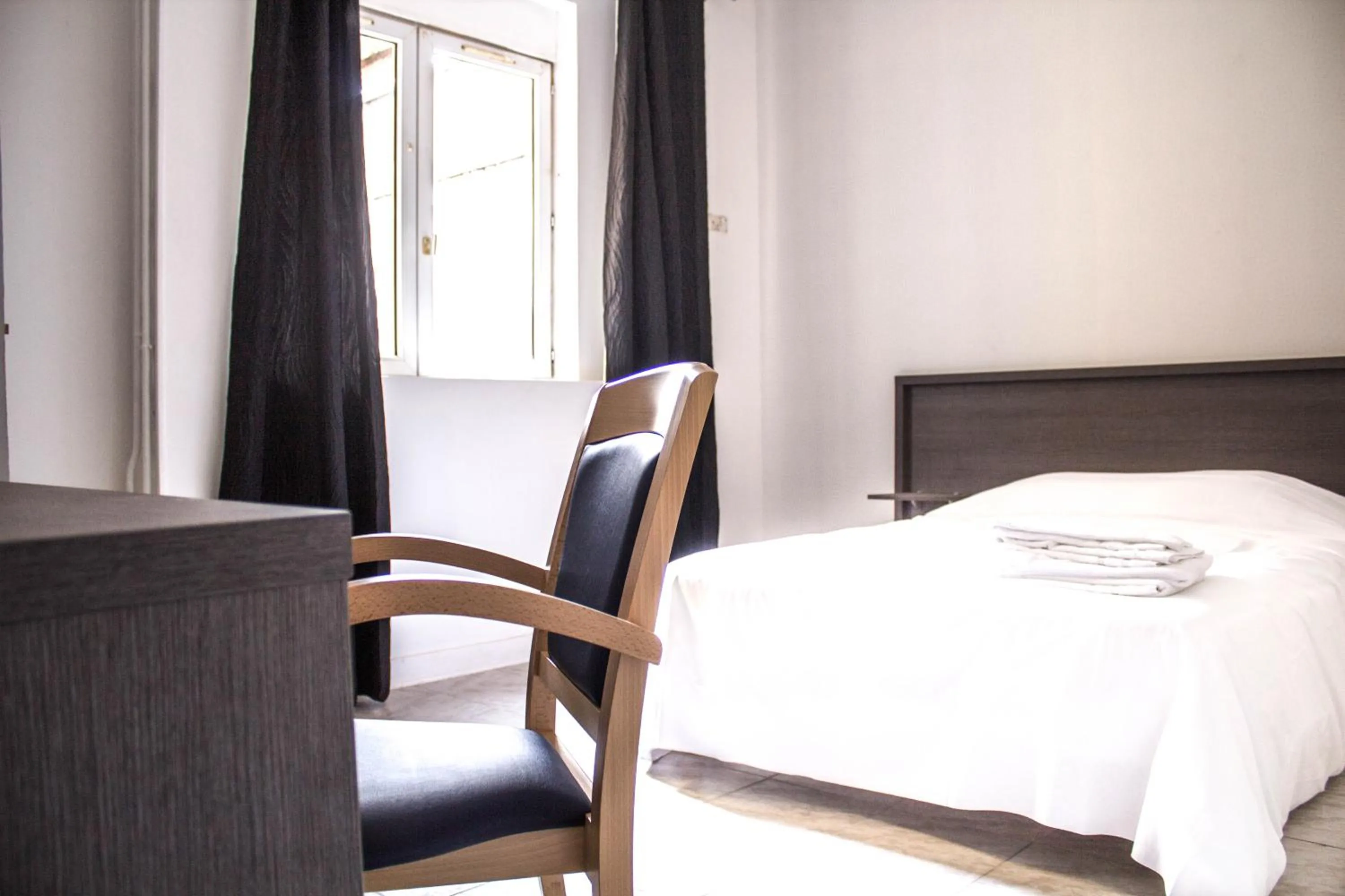 Bed in Hotel Le Jardin