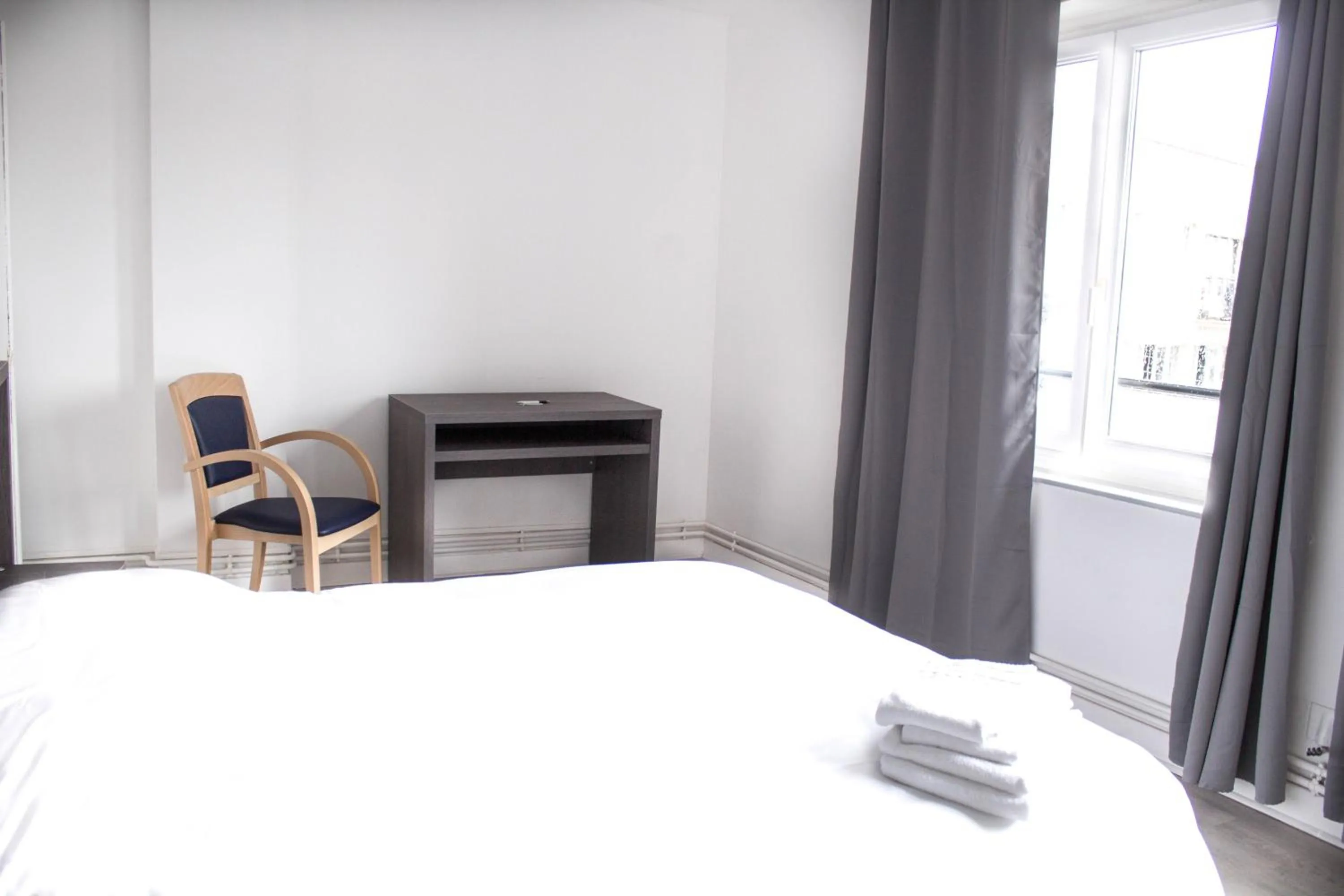 Bed in Hotel Le Jardin