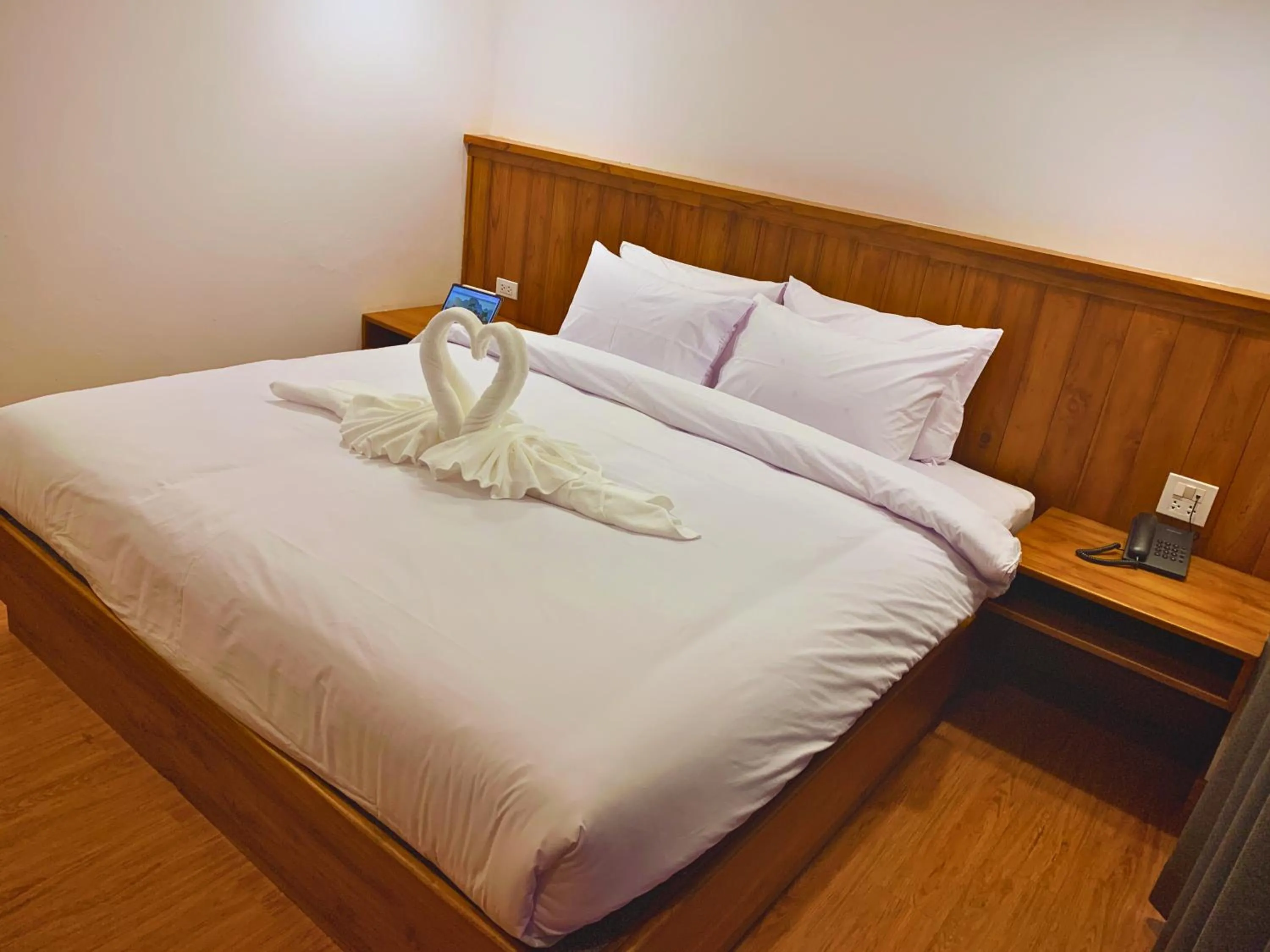 Bed in Oudomsin VangVieng Hotel