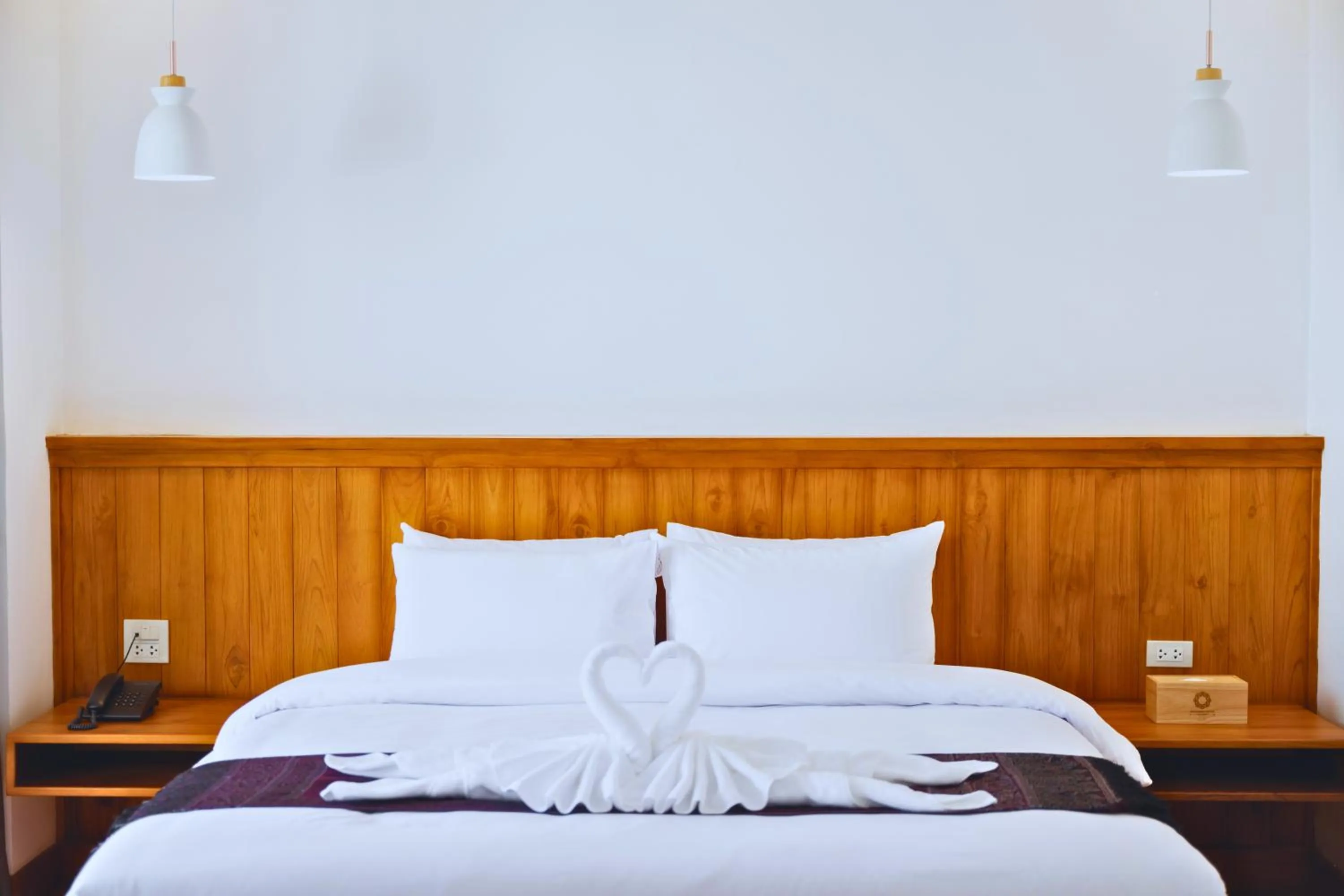 Bed in Oudomsin VangVieng Hotel