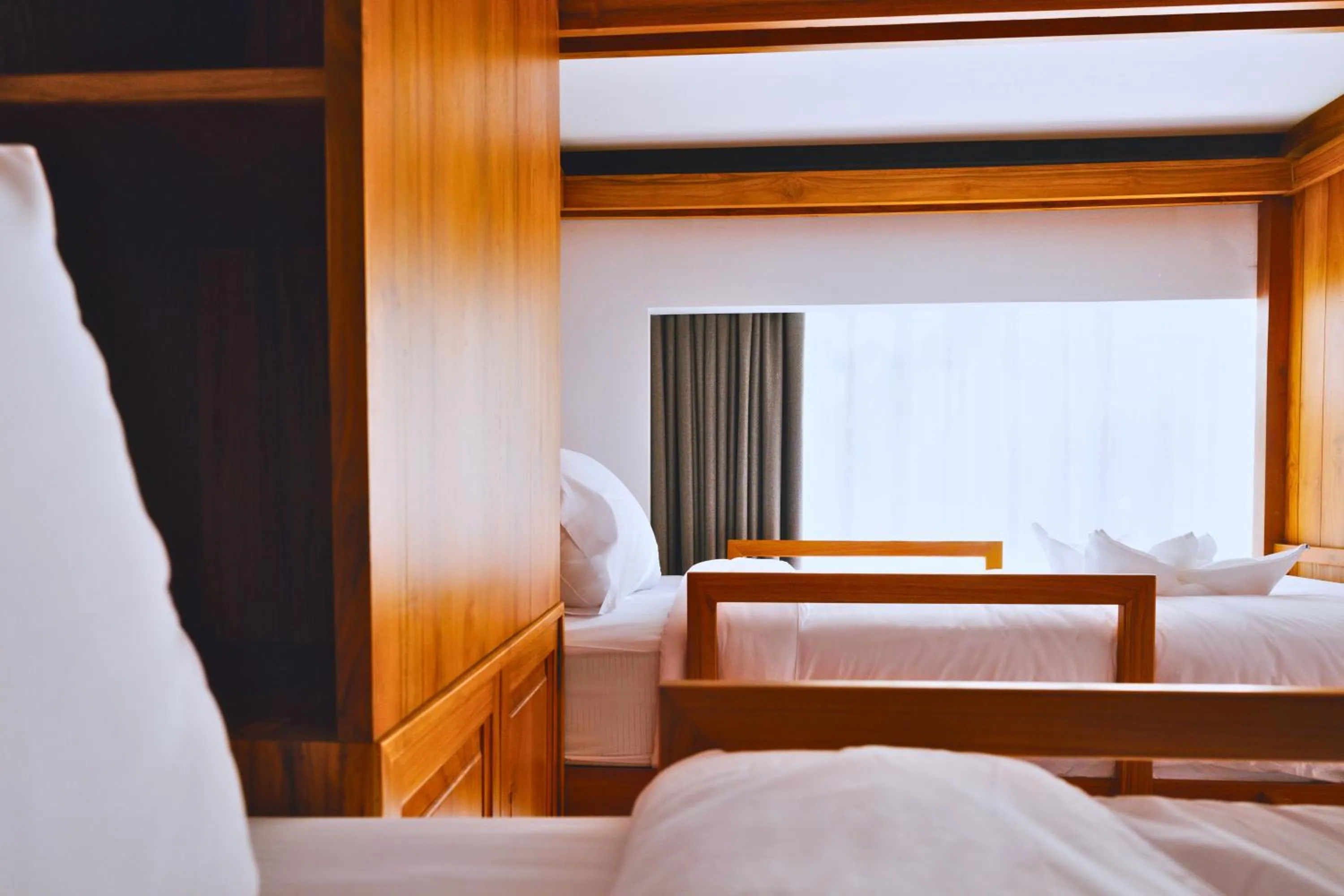 Bed in Oudomsin VangVieng Hotel