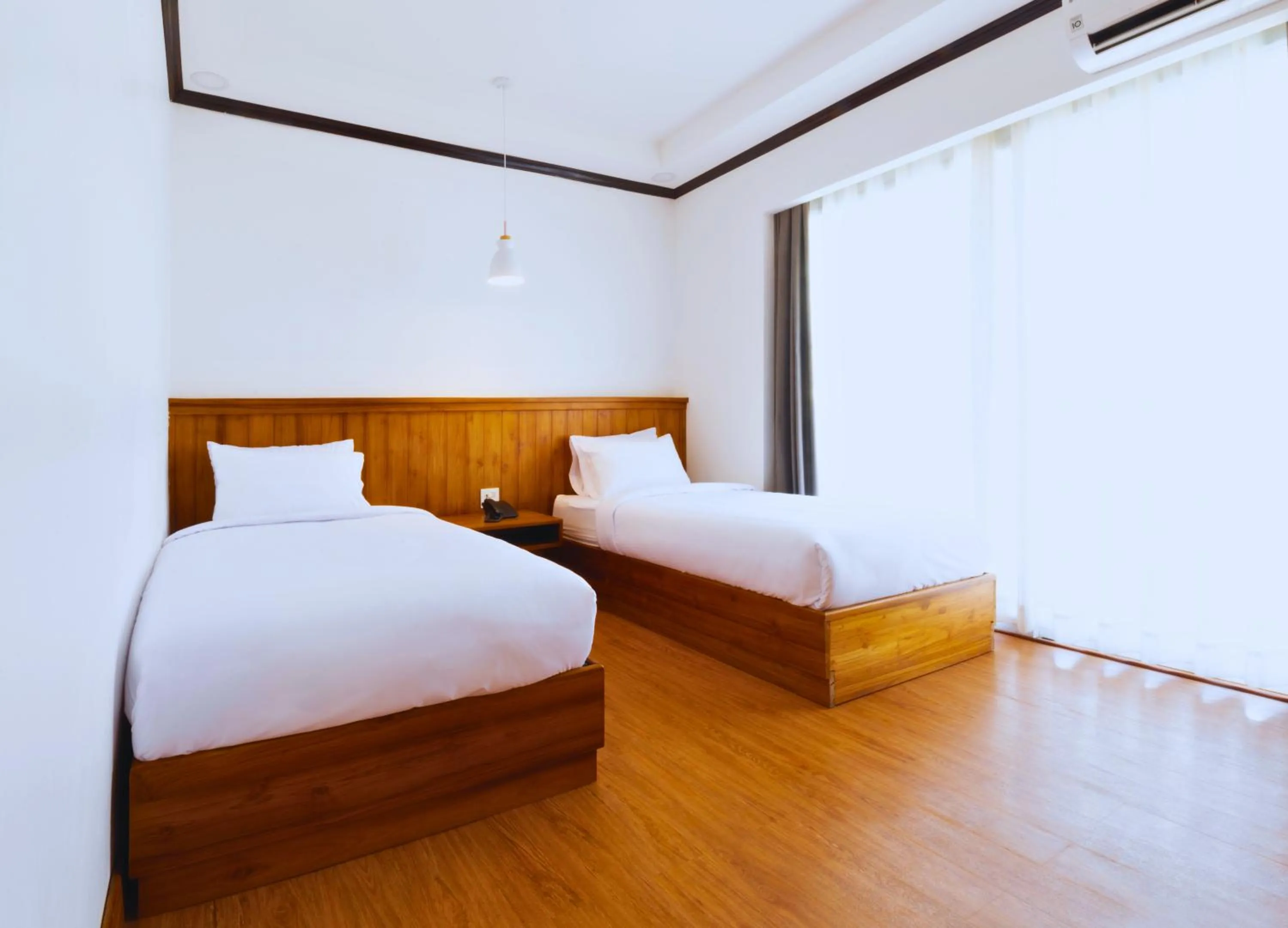 Bed in Oudomsin VangVieng Hotel