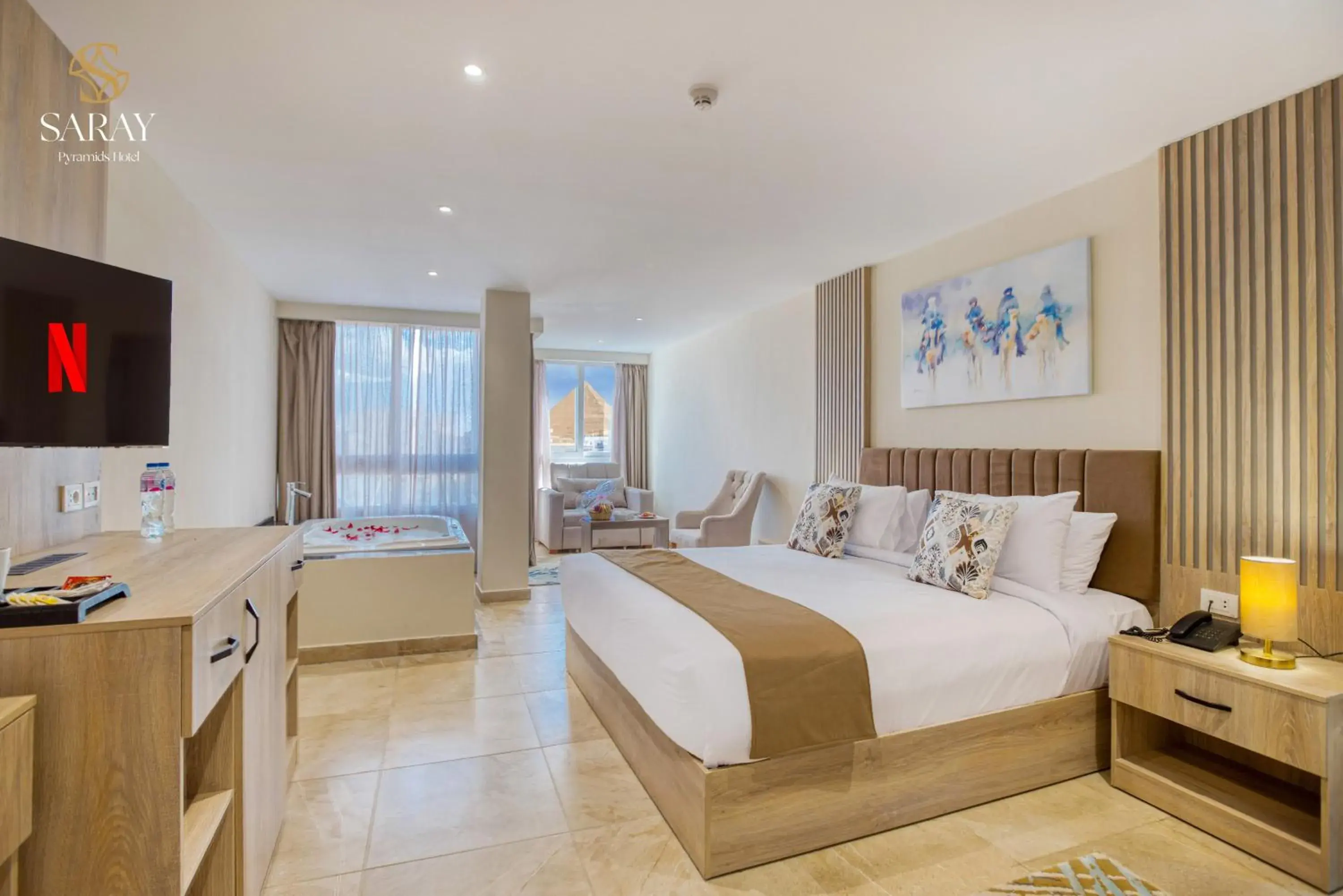 Communal lounge/ TV room, Bed in Saray Pyramids & Museum View Hotel Communal lounge/ TV room, Bed in Saray Pyramids & Museum View Hotel