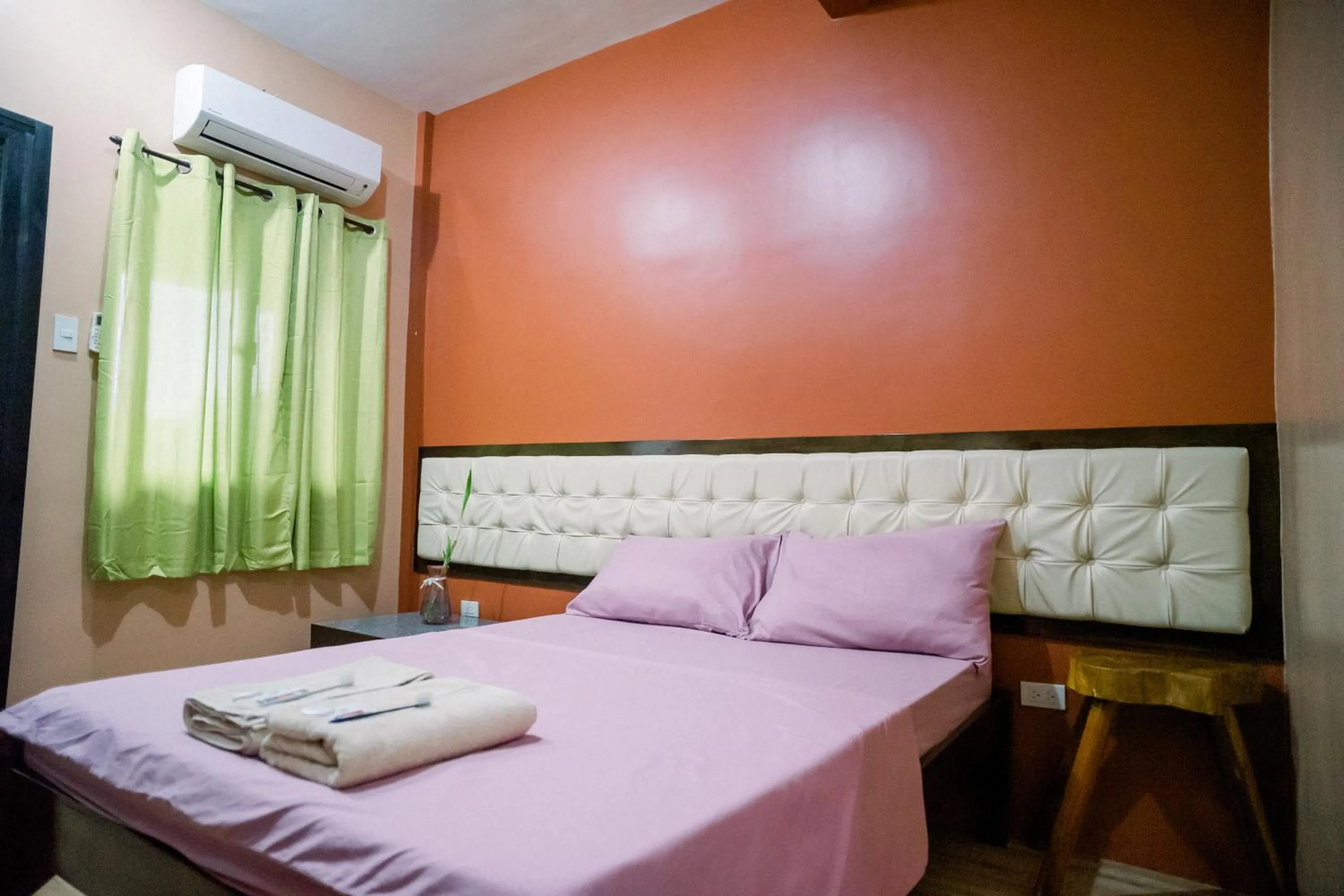 Bed in Alona Princess Suites